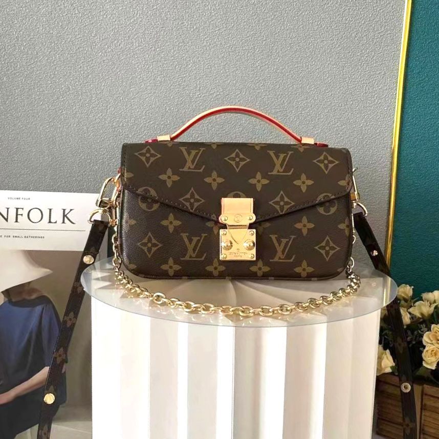 Louis Vuitton Pochette M?tis East West bag in Monogram canvas with natural cowhide leather trim and gold-tone hardware. image 1