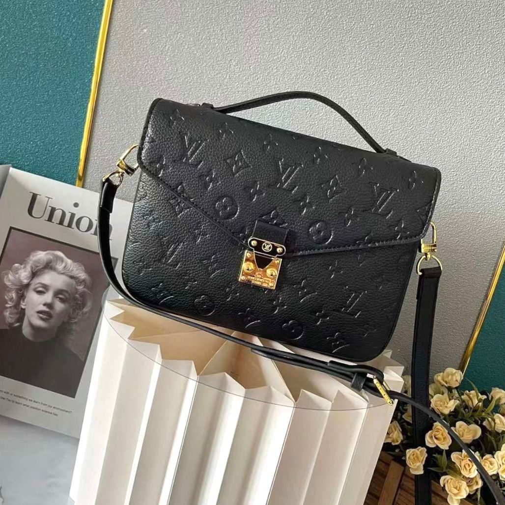 Louis Vuitton Pochette M?tis bag in black Monogram Empreinte leather. image 1