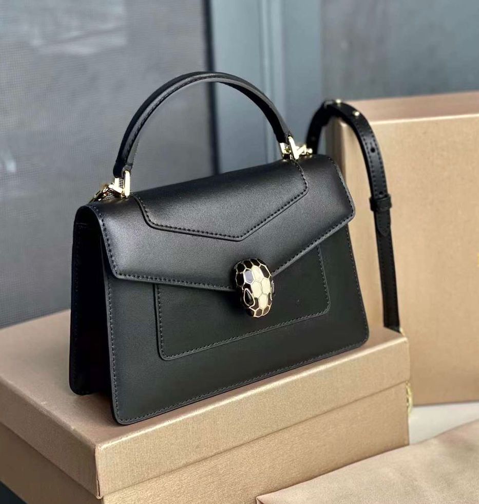 Bvlgari Serpenti Forever mini top handle bag in black calf leather. image 1