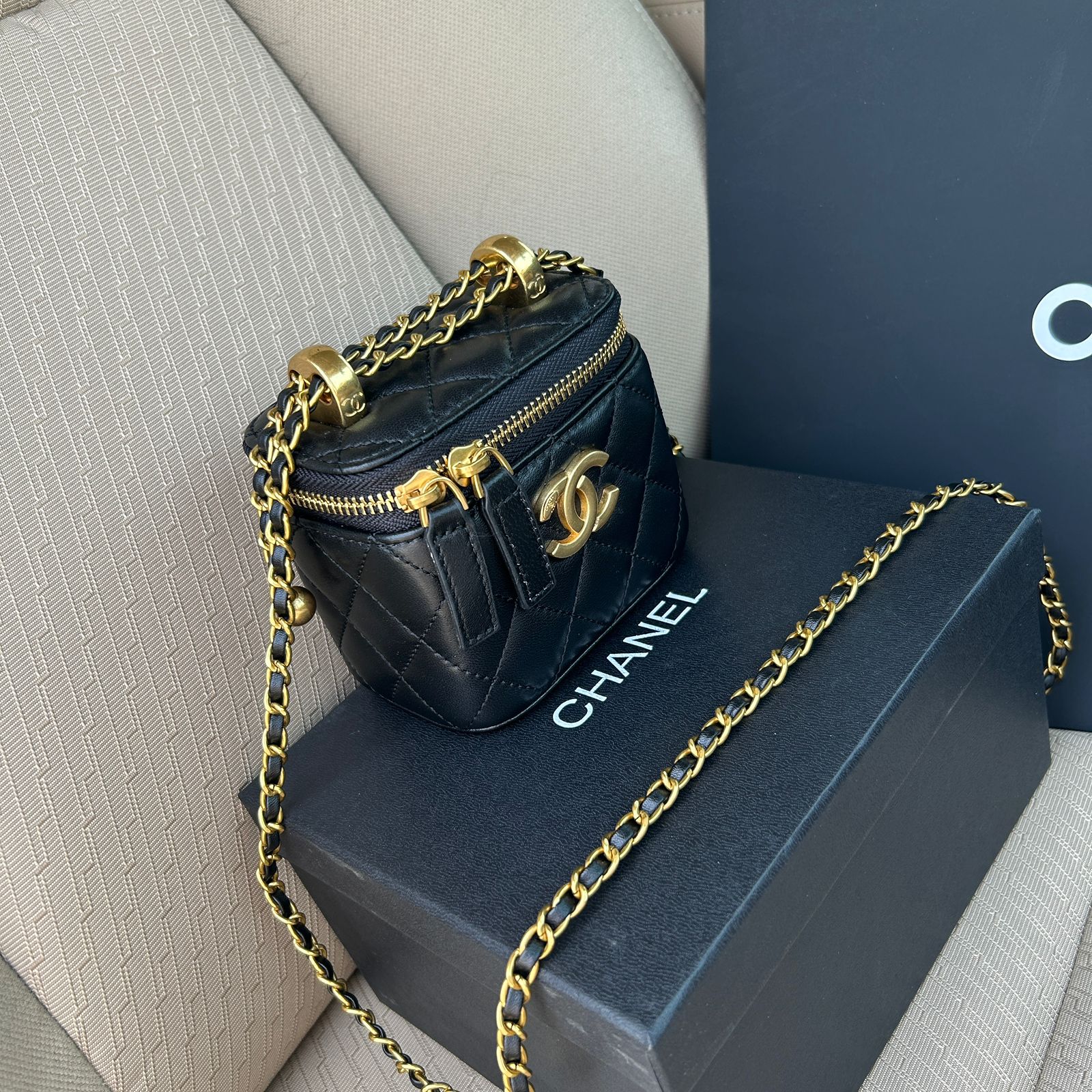 Chanel Small Vanity with Chain in black quilted calfskin leather with gold-tone metal hardware. image 1