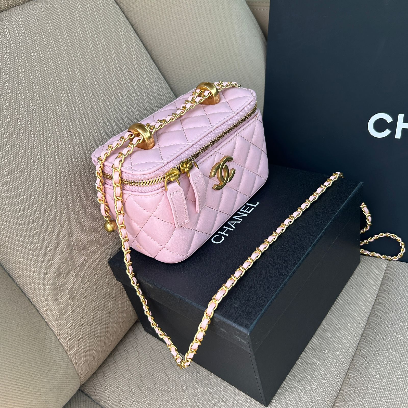 Chanel Small Vanity with Chain bag in light pink lambskin or caviar leather and gold-tone metal hardware. image 1