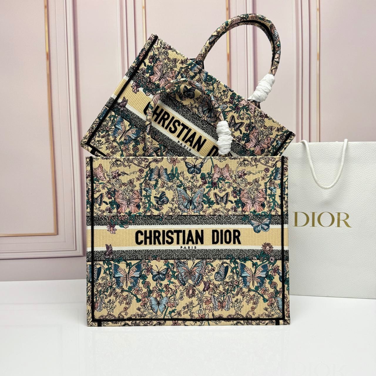 Dior Book Tote in the multicolor Dior Saisons Printemps-?t? embroidery, also known as the Animaux Fantastiques or floral and butterfly print canvas. image 1
