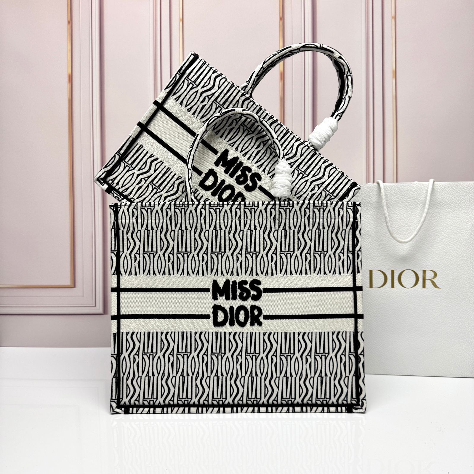 Christian Dior Book Tote in black and white canvas with the "Miss Dior" motif. image 1