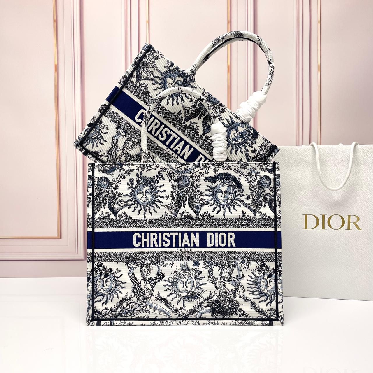 Dior Book Tote in the medium size with ecru and blue Toile de Jouy Soleil embroidery. image 1
