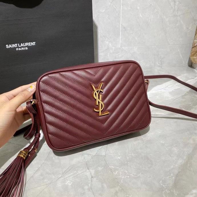 Saint Laurent Monogram Lou Camera Bag in dark legion red or burgundy chevron-quilted calfskin leather with a detachable tassel and brass hardware. image 1