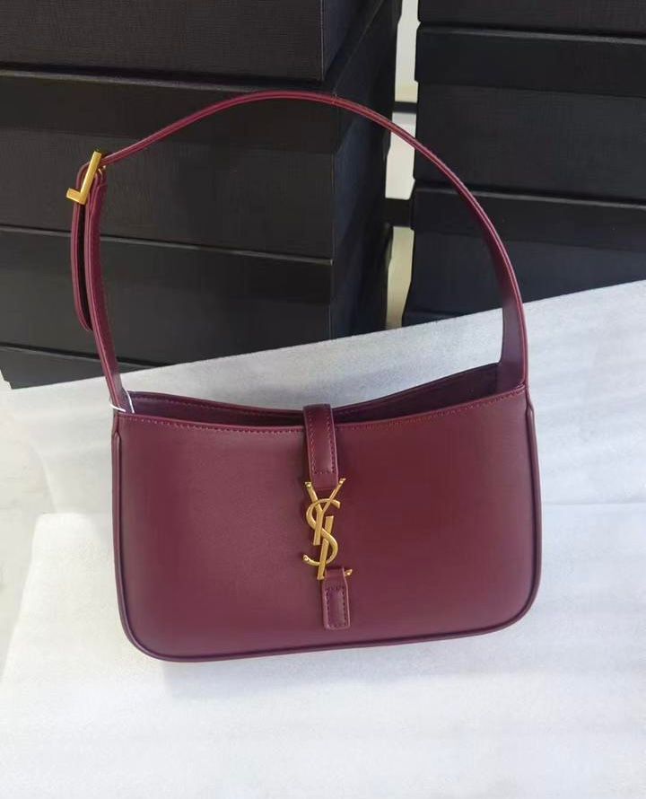 Saint Laurent Le 5 ? 7 hobo bag in dark red or burgundy patent leather with a gold-tone YSL hook closure. image 1