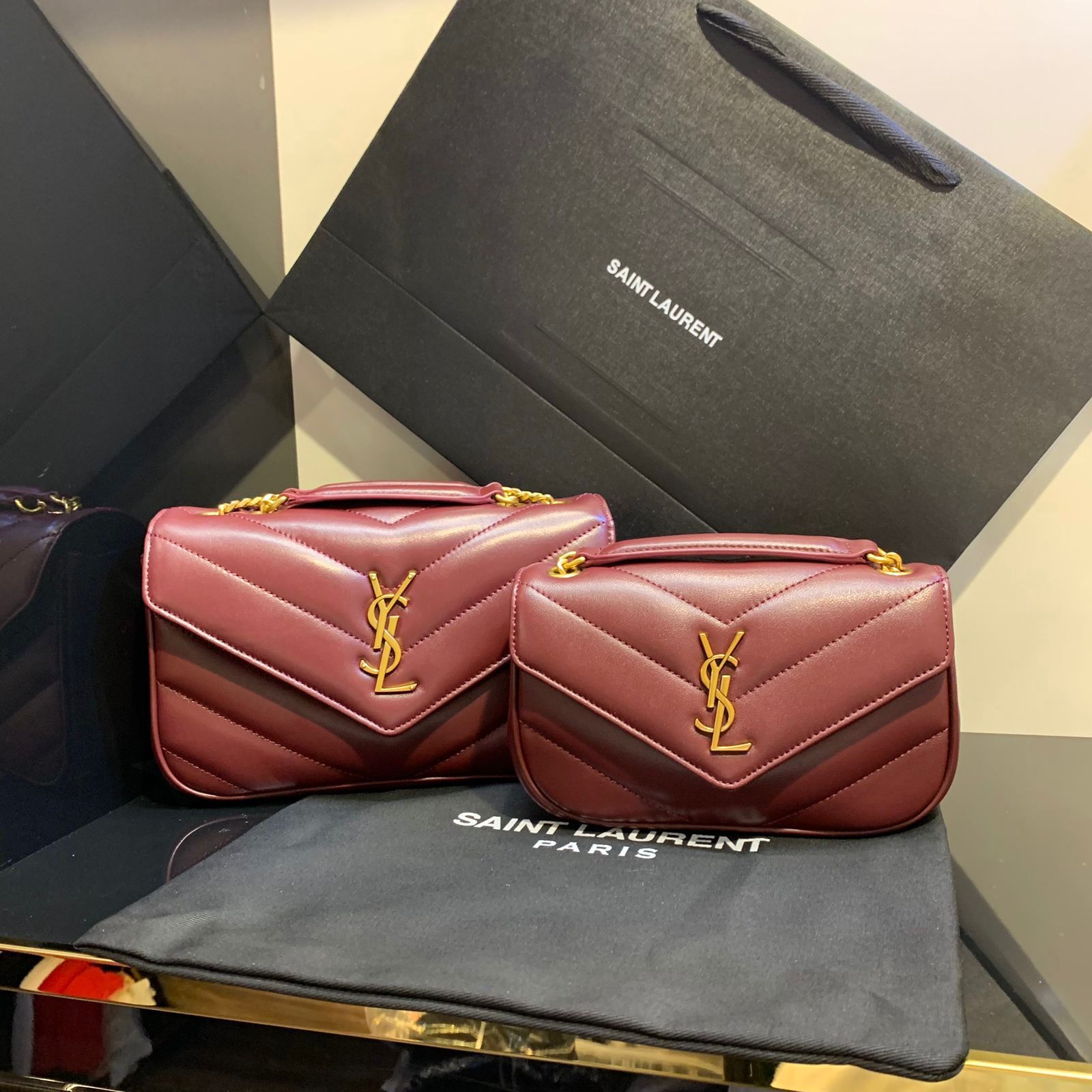 Saint Laurent Loulou mini and small chain bags in burgundy quilted lambskin leather. image 1
