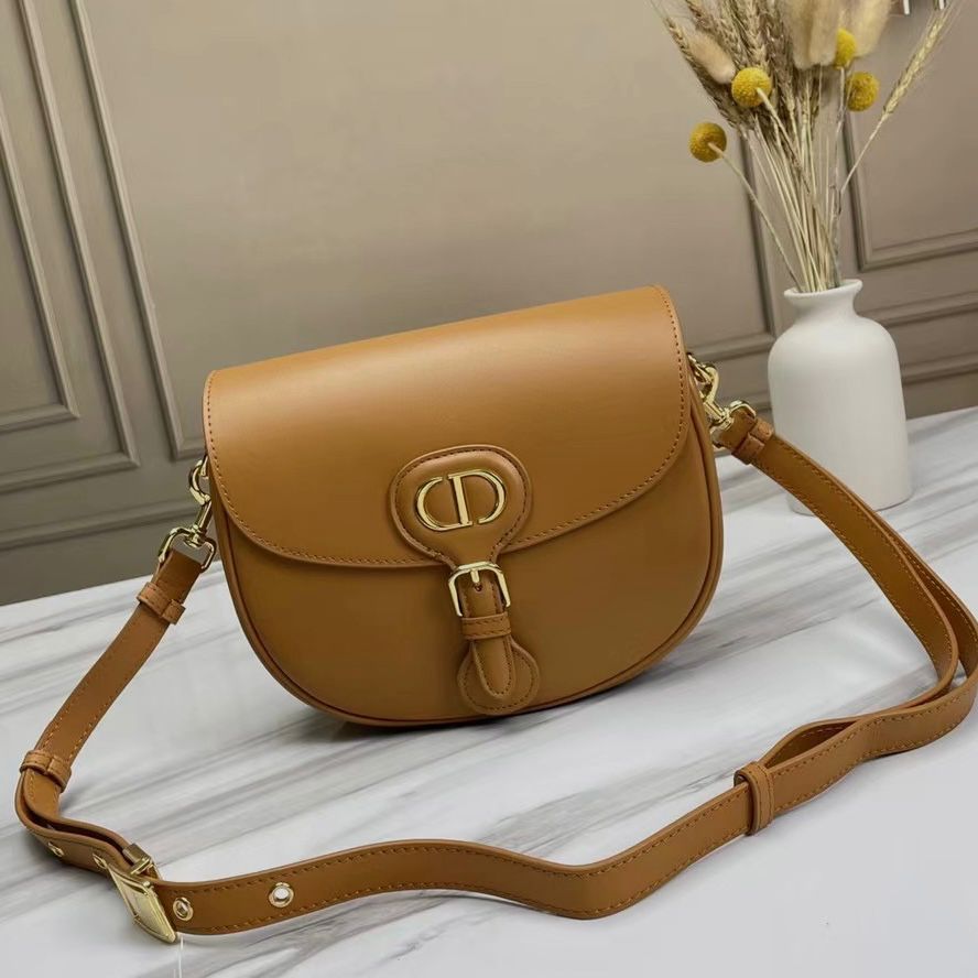 Dior Bobby bag in camel or caramel smooth calfskin leather with a gold-finish metal "CD" buckle. image 1