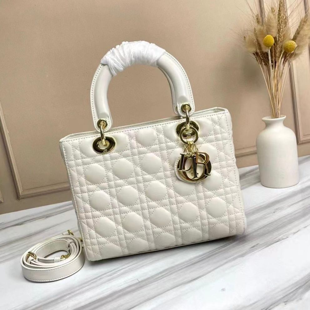 Dior Lady Dior bag in white or latte lambskin with Cannage stitching and pale gold-finish metal D.I.O.R. charms. image 1