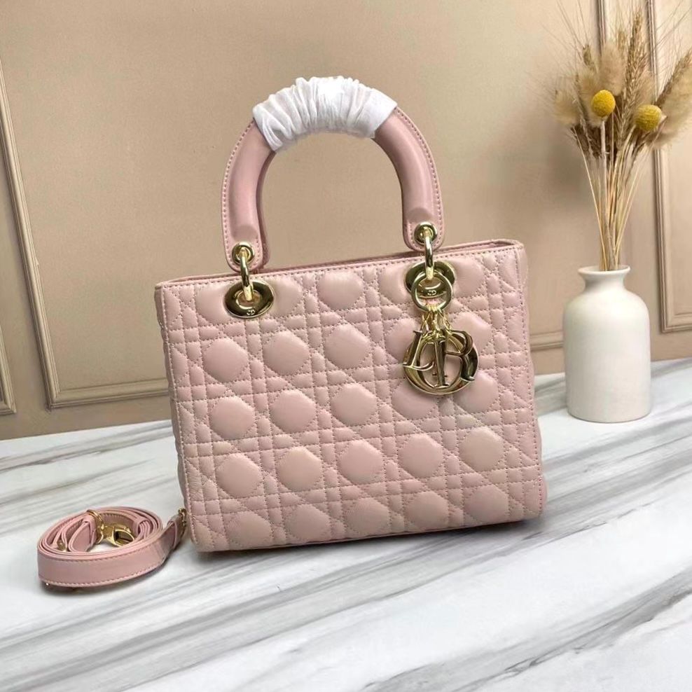 Dior Medium Lady Dior bag in powder pink lambskin with Cannage stitching and gold-finish metal D.I.O.R. charms. image 1