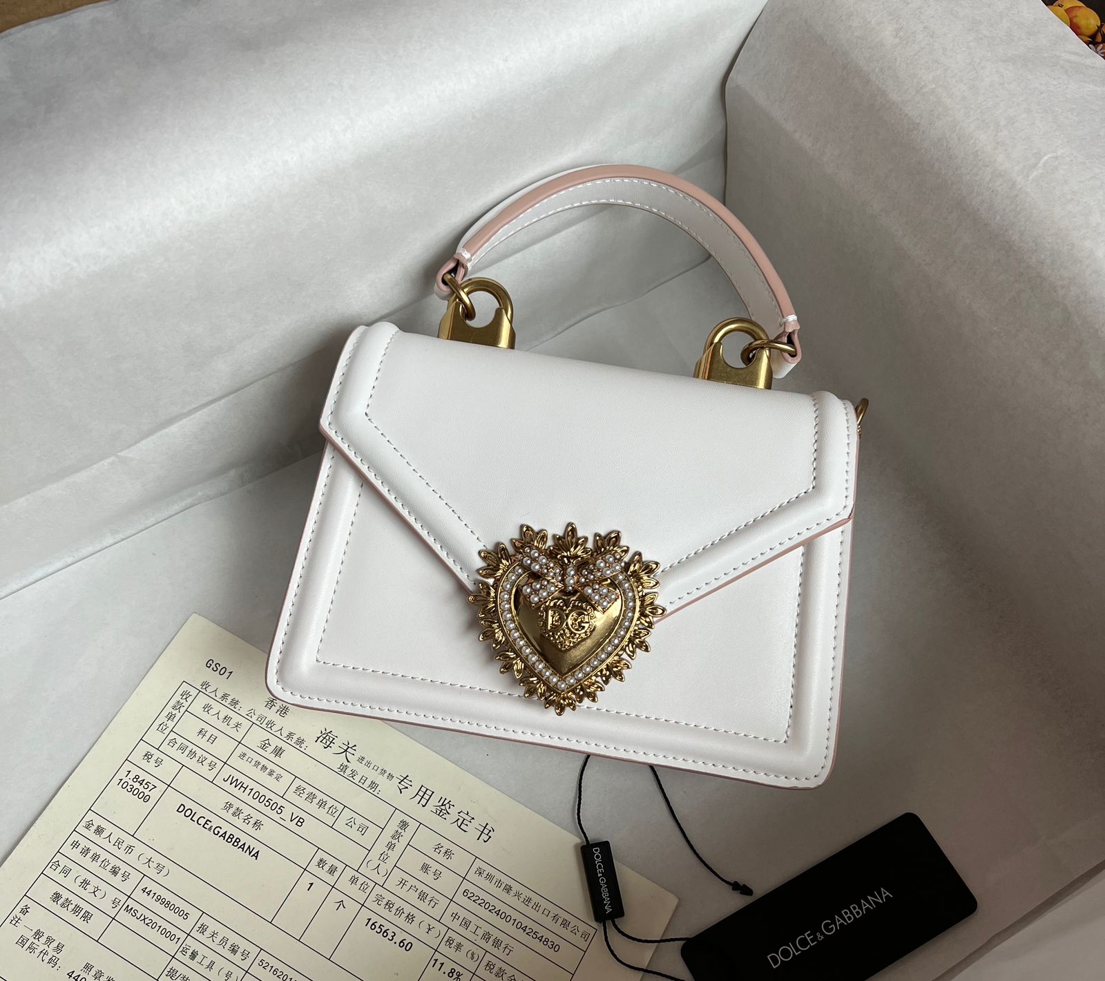Dolce & Gabbana Small Devotion top handle bag in white smooth calfskin leather with a jeweled heart closure. image 1