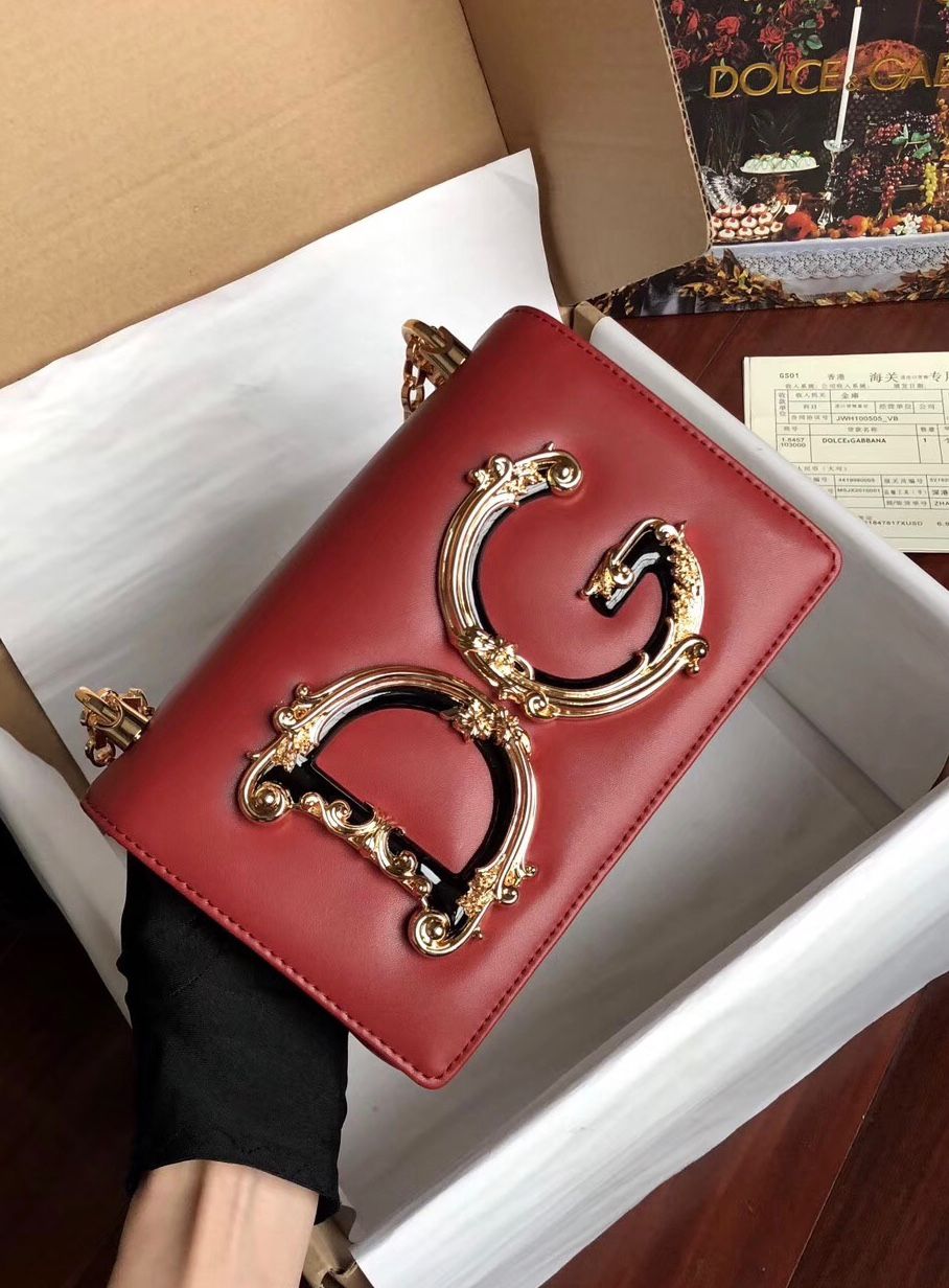 Dolce & Gabbana DG Girls phone bag with a baroque-style logo plaque and a sliding chain shoulder strap. image 1
