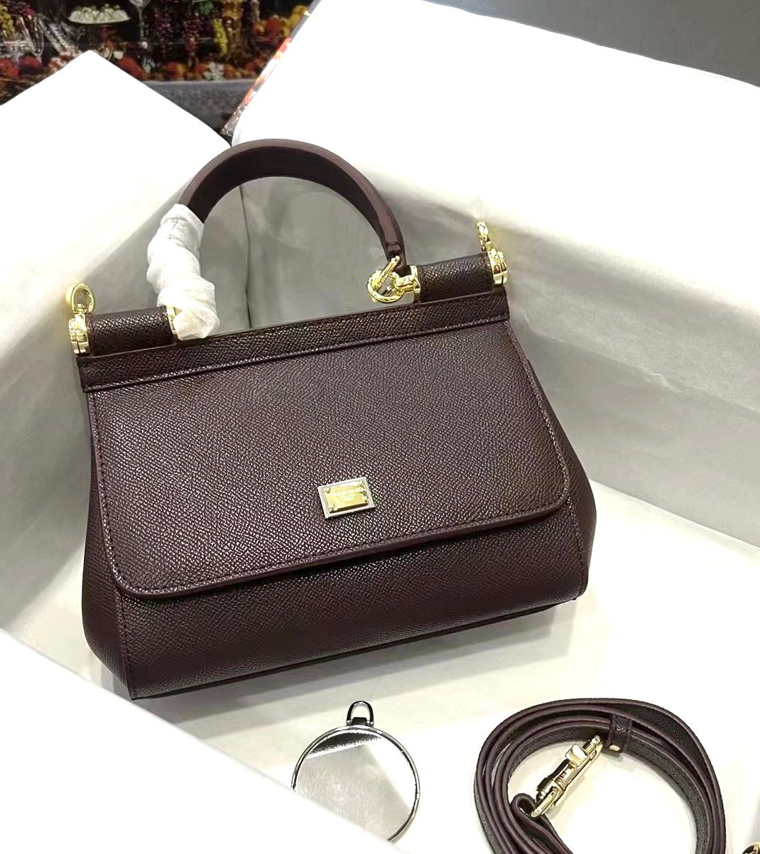 Dolce & Gabbana small Sicily top handle bag in burgundy dauphine leather. image 1