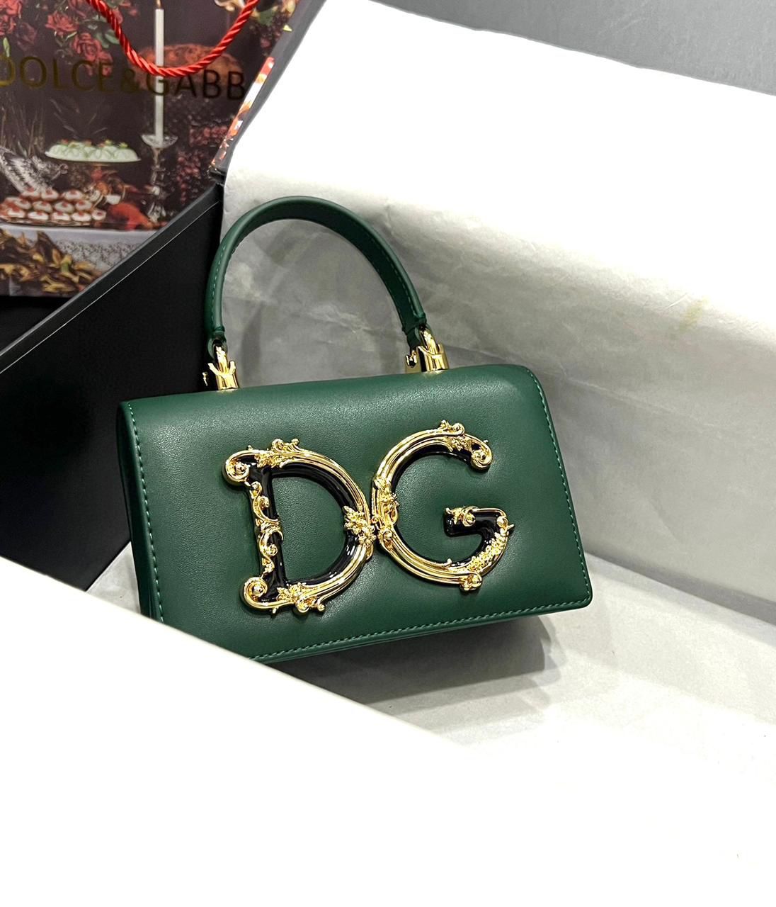 Dolce & Gabbana DG Girls mini top-handle bag in green calfskin leather with a gold-tone baroque logo. image 1