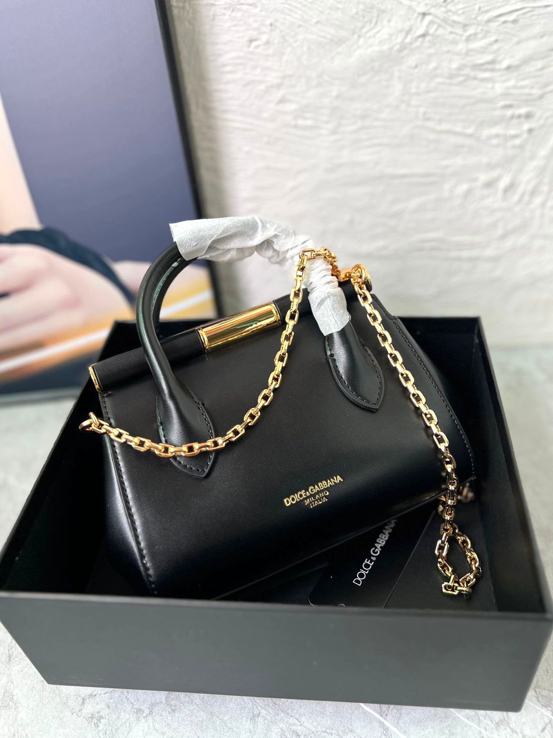 Dolce & Gabbana Marlene small black leather top-handle bag with a detachable chain strap. image 1