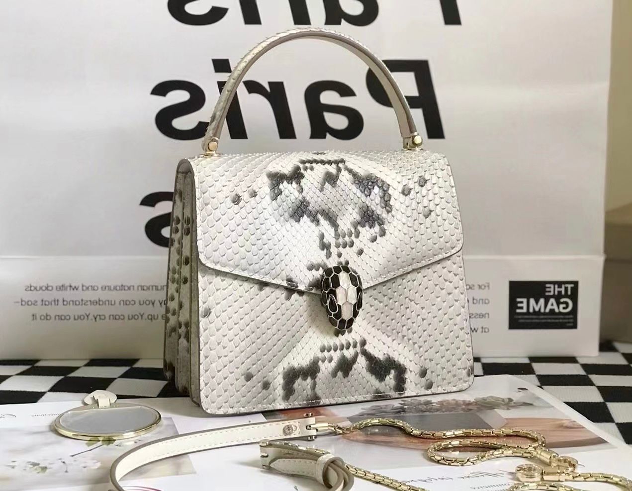 Bvlgari Serpenti Forever top handle bag crafted from genuine python or lizard skin leather. image 1