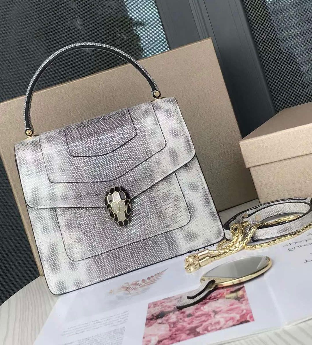 Bvlgari Serpenti Forever small top-handle bag in metallic karung leather with a shimmering finish. image 1