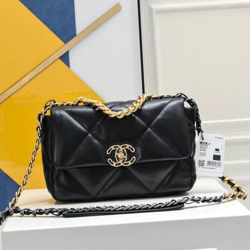 Chanel 19 handbag in black shiny lambskin leather with gold-tone, silver-tone, and ruthenium-finish metal hardware. image 1