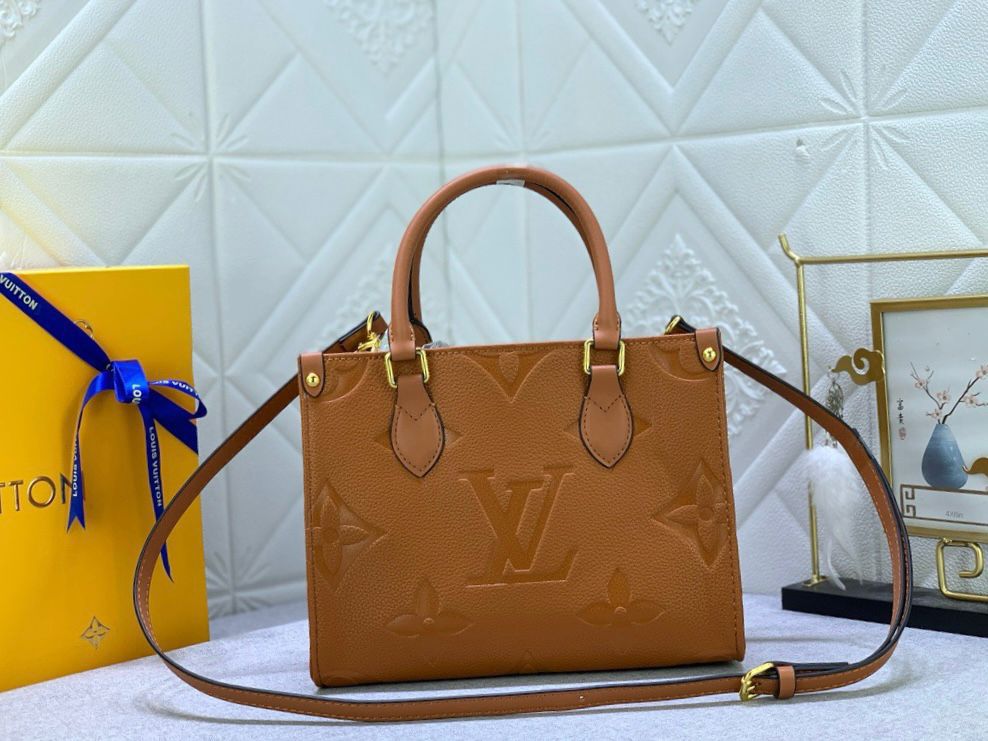Louis Vuitton OnTheGo PM tote bag in the natural Monogram Empreinte leather. image 2