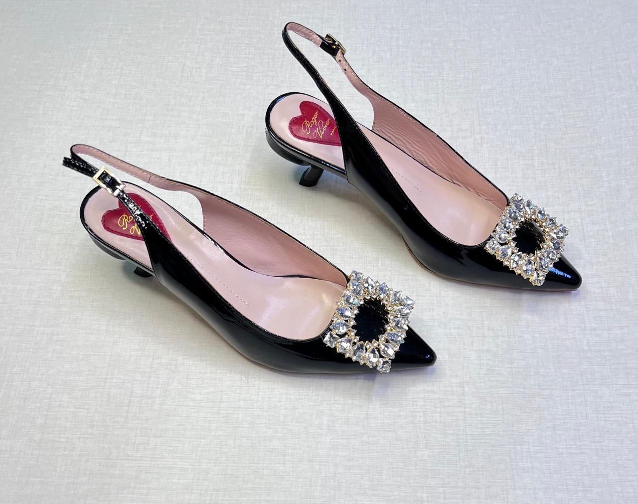 Roger Vivier Virgule Strass crystal-buckle slingback pumps in black patent leather. image 1
