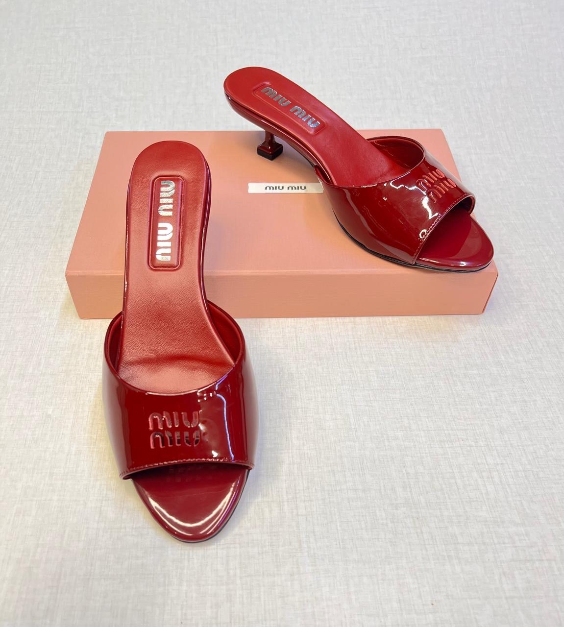 Miu Miu red patent leather mules. image 2