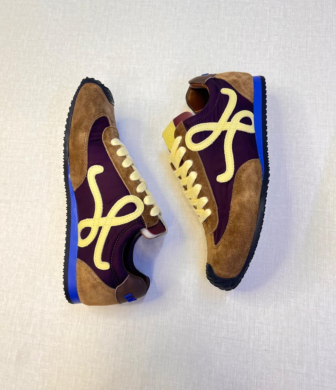 Loewe Ballet Runner 2.0 sneakers in a brown, yellow, and blue colorway, made from suede, nylon, and leather. image 1