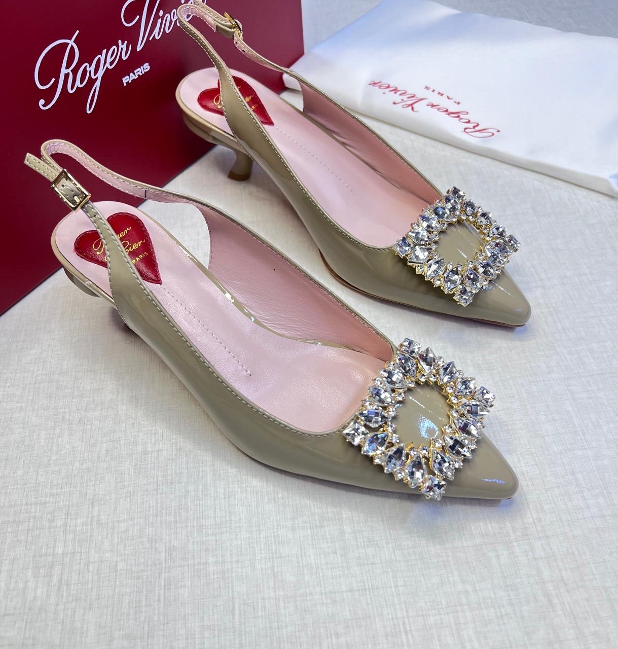 Roger Vivier Virgule Strass Buckle Slingback Pumps in patent leather. image 1