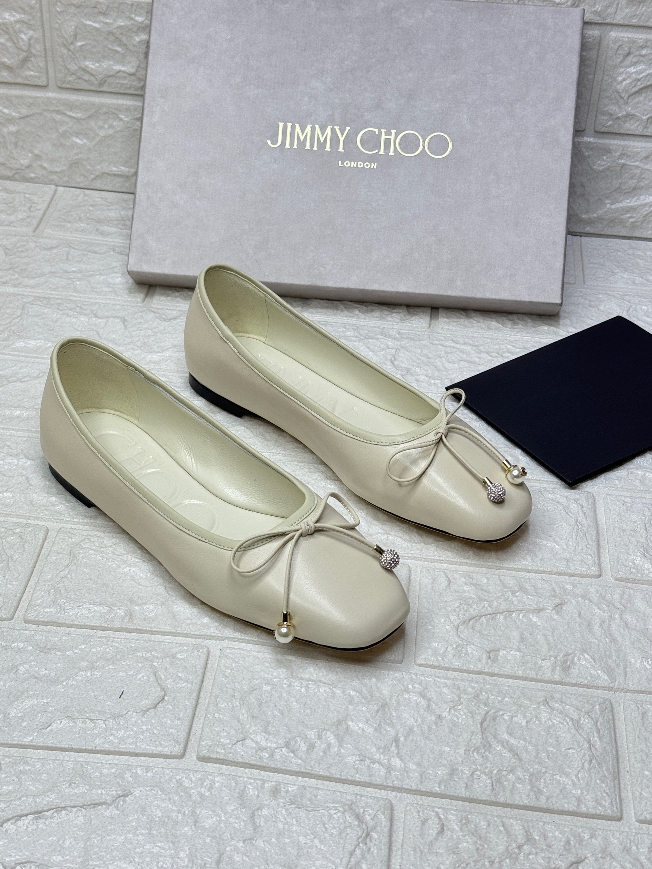 Jimmy Choo Elme ballet flats in latte nappa leather with pearl embellishment. image 1
