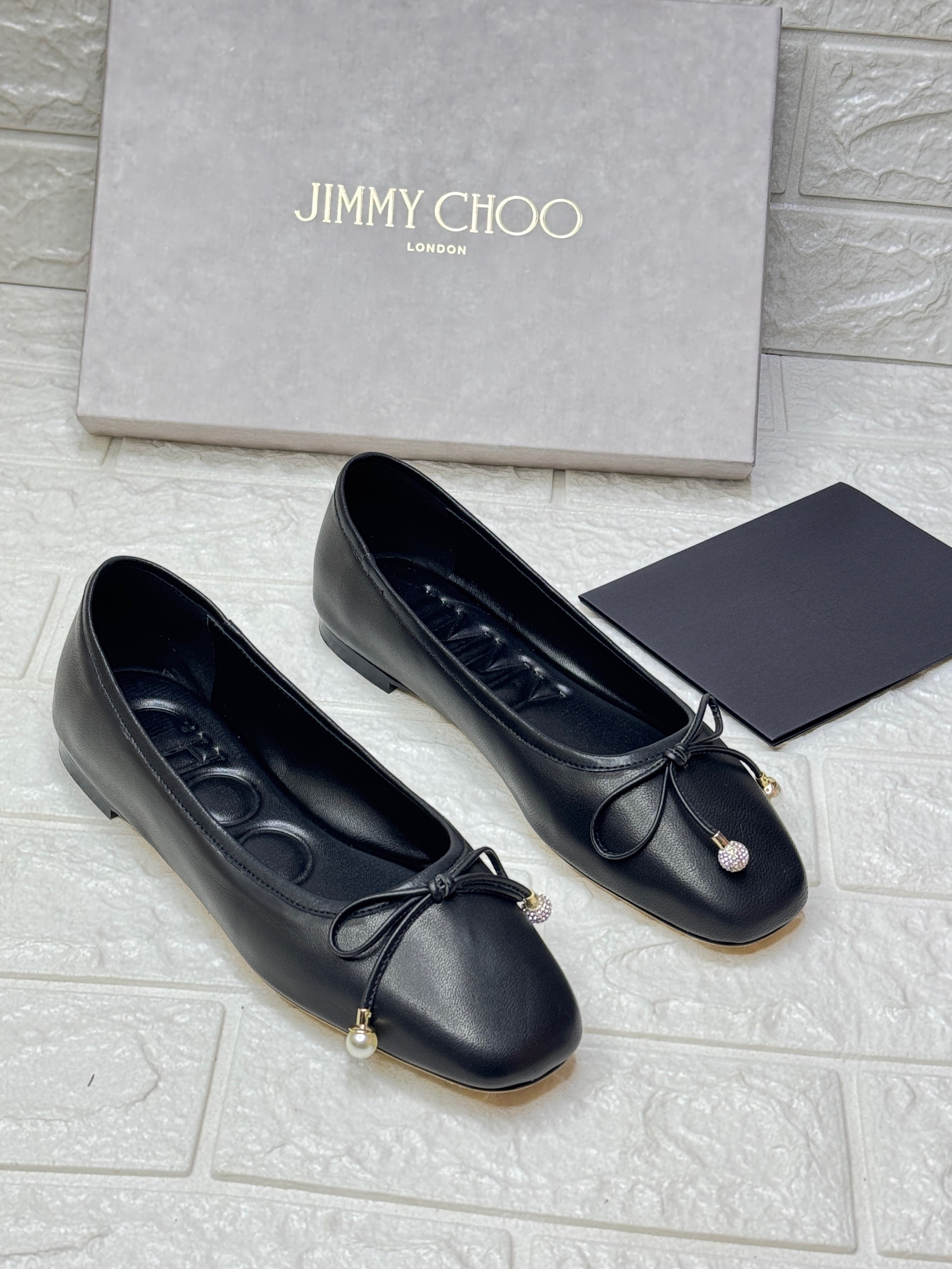 Jimmy Choo Elme ballet flats in black nappa leather with pearl embellishments image 1