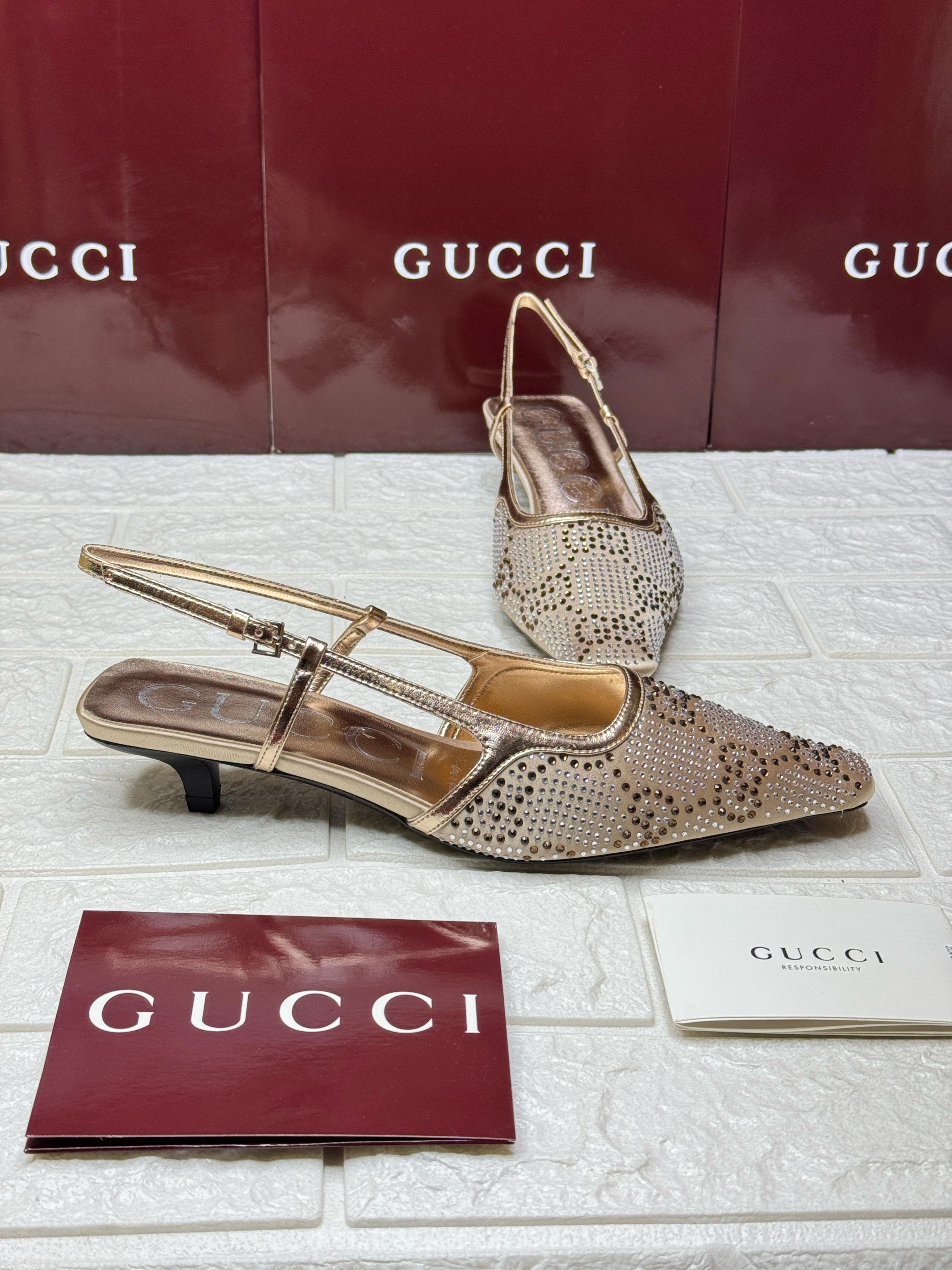 Gucci crystal-embellished slingback pumps with a kitten heel. image 1