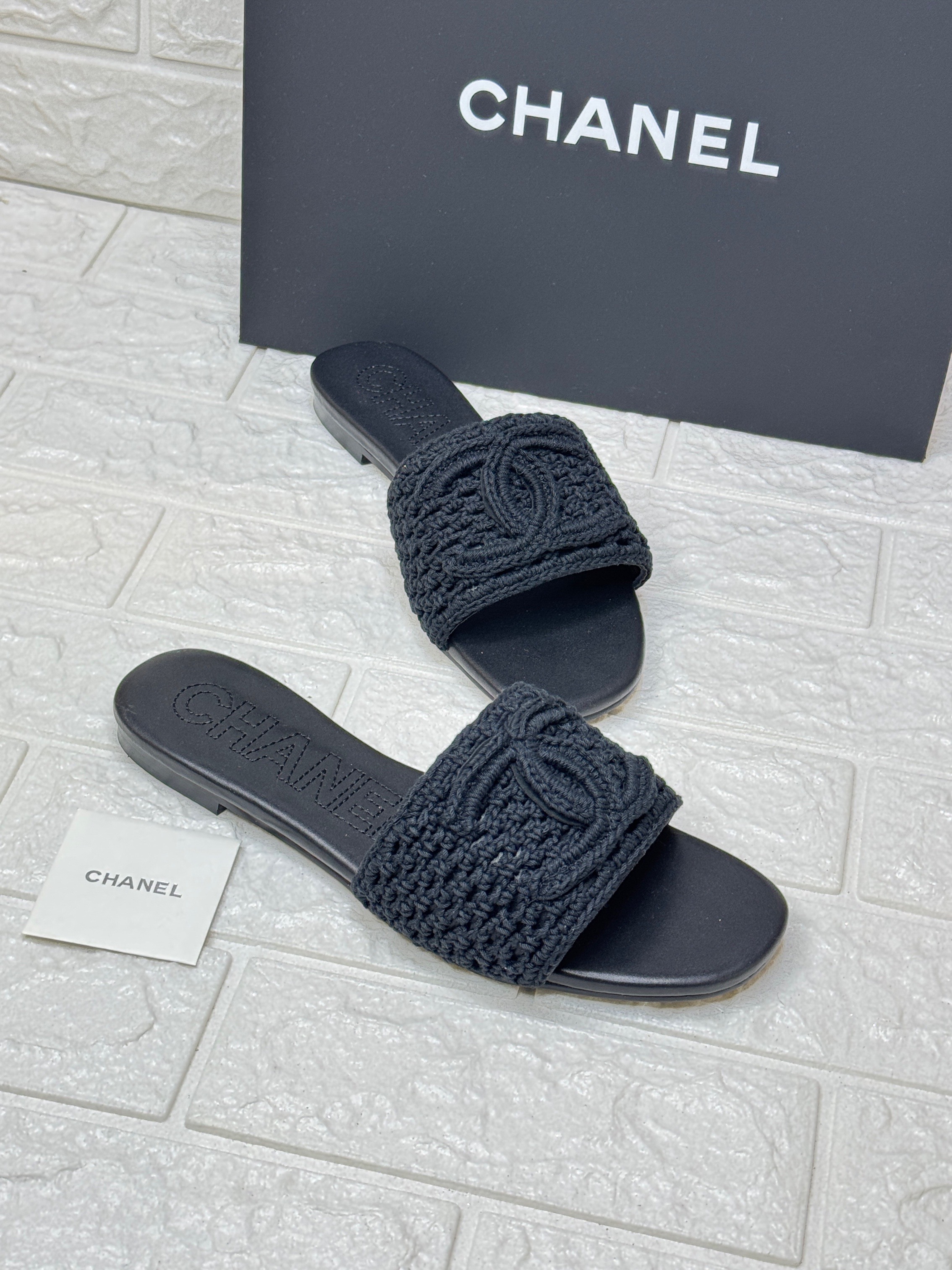 Chanel black crochet textile slides. image 1