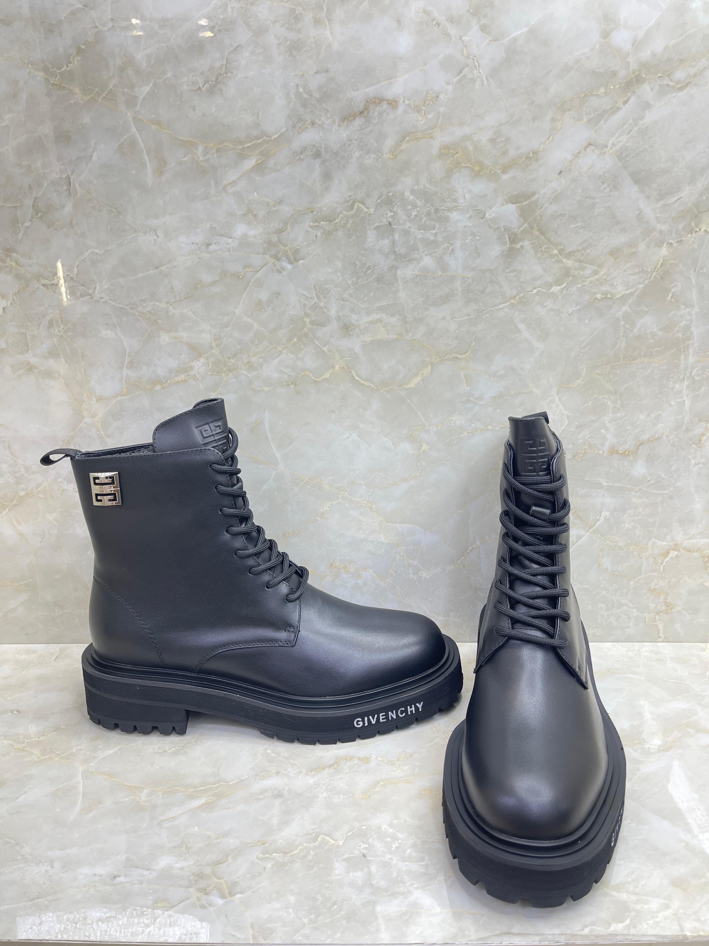 Givenchy black leather lace-up boots. image 1