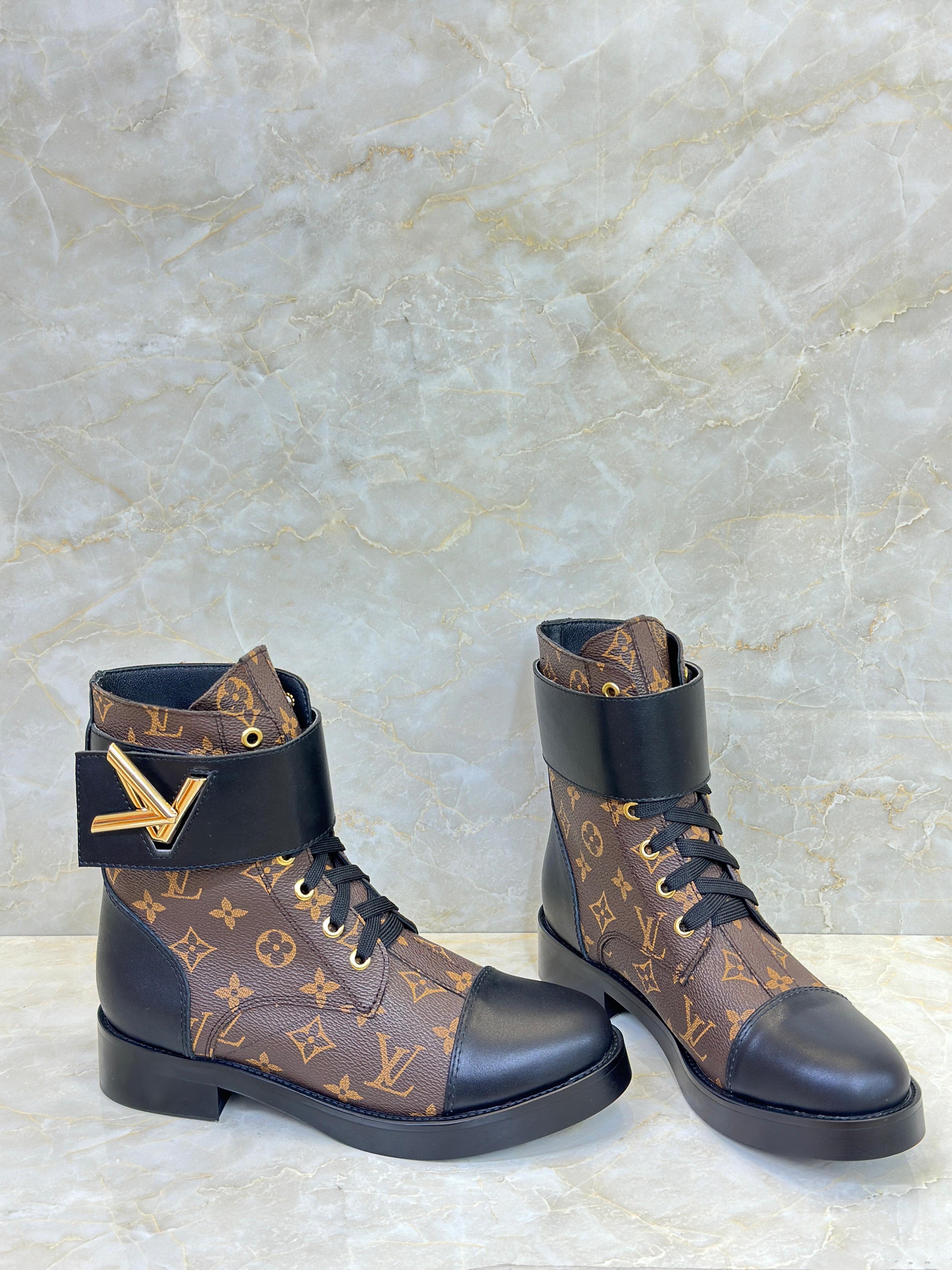 Louis Vuitton Bicolor Monogram Wonderland Flat Ranger boot in brown monogram coated canvas and black leather. image 1