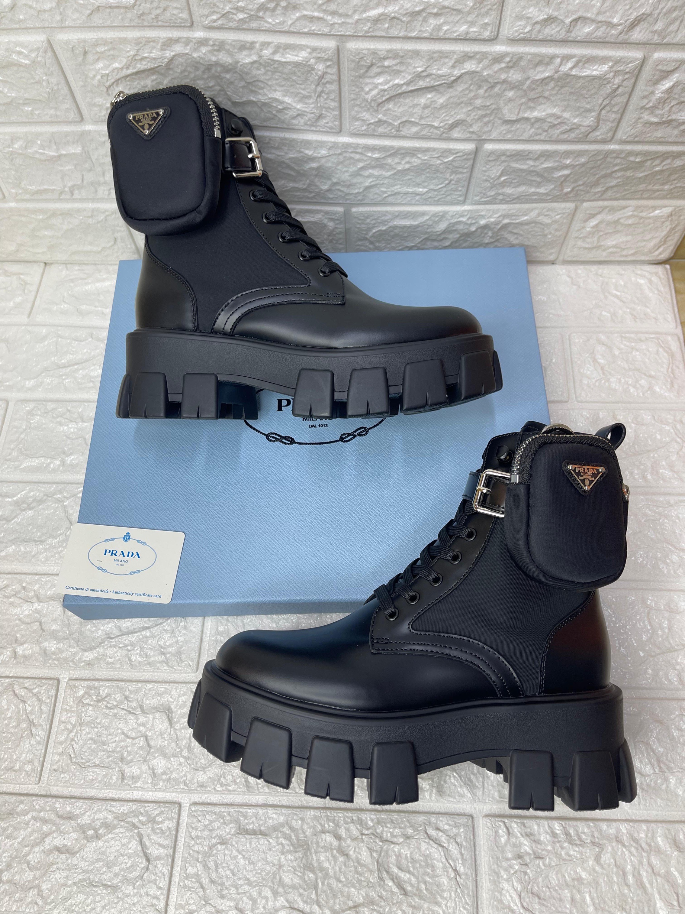 Prada Monolith combat boots in brushed leather and Re-Nylon with a removable pouch. image 1