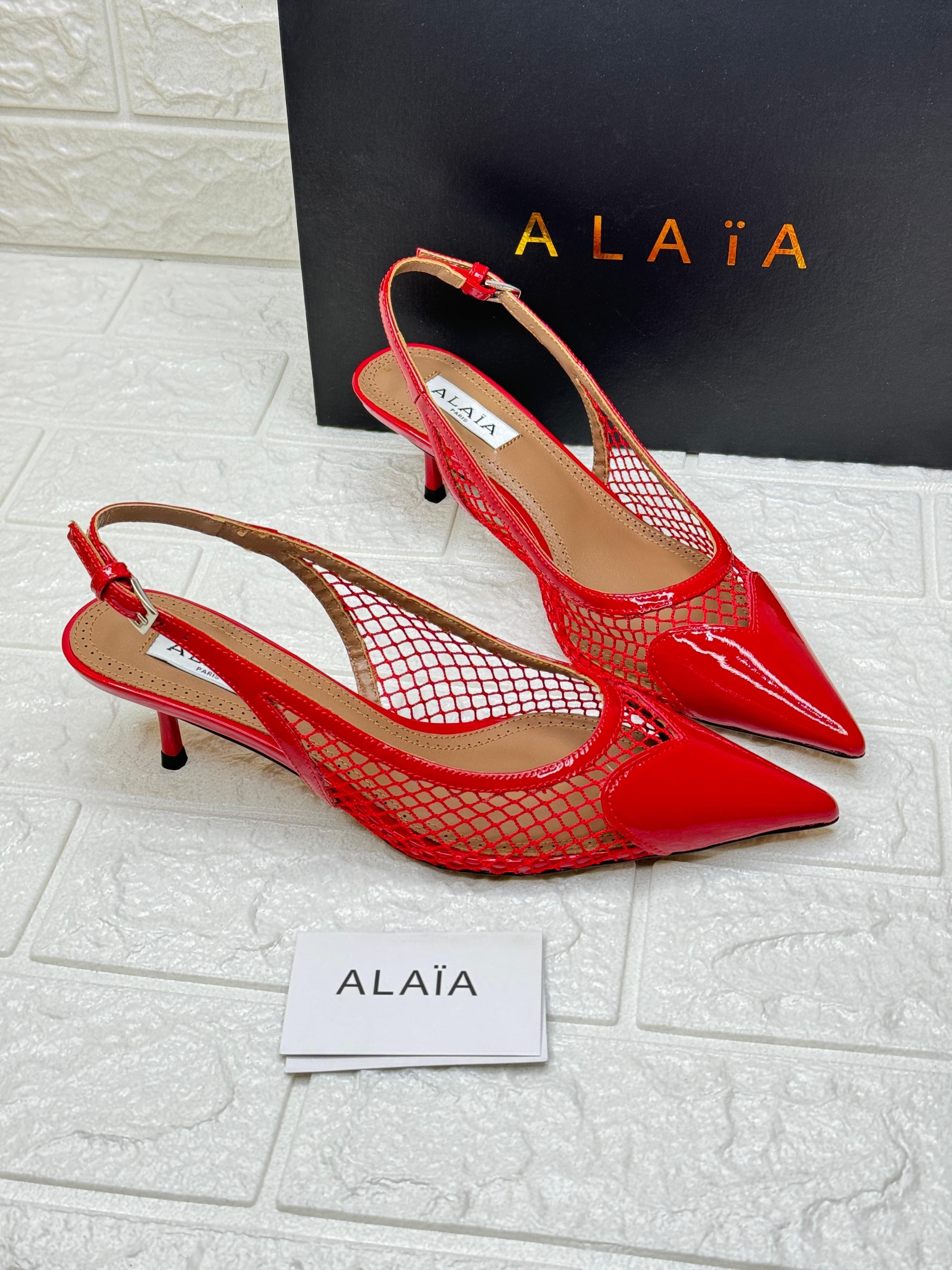 Alaïa fishnet slingback pumps in red patent leather. image 1