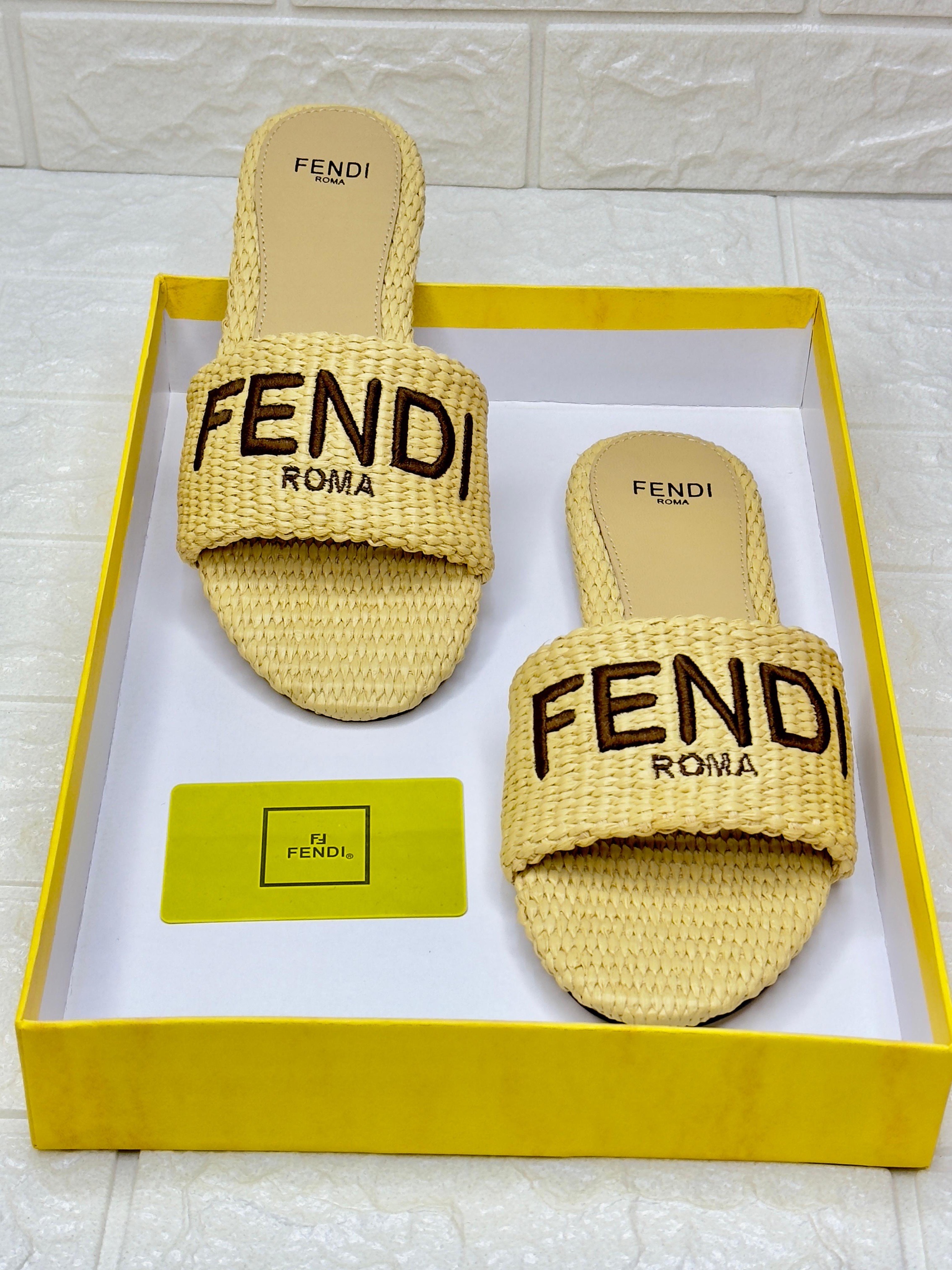 Fendi Sunshine raffia platform slides with an embroidered logo image 1