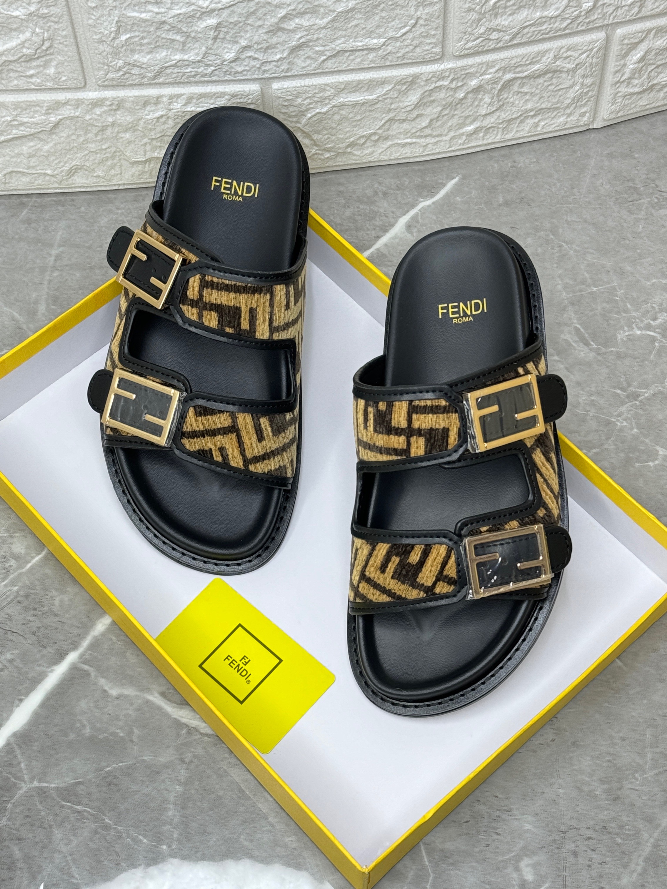 Fendi Feel sandals with wide, adjustable straps in black and tobacco FF motif jacquard fabric. image 1