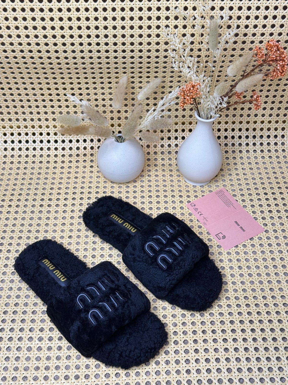 Miu Miu black logo slippers. image 1