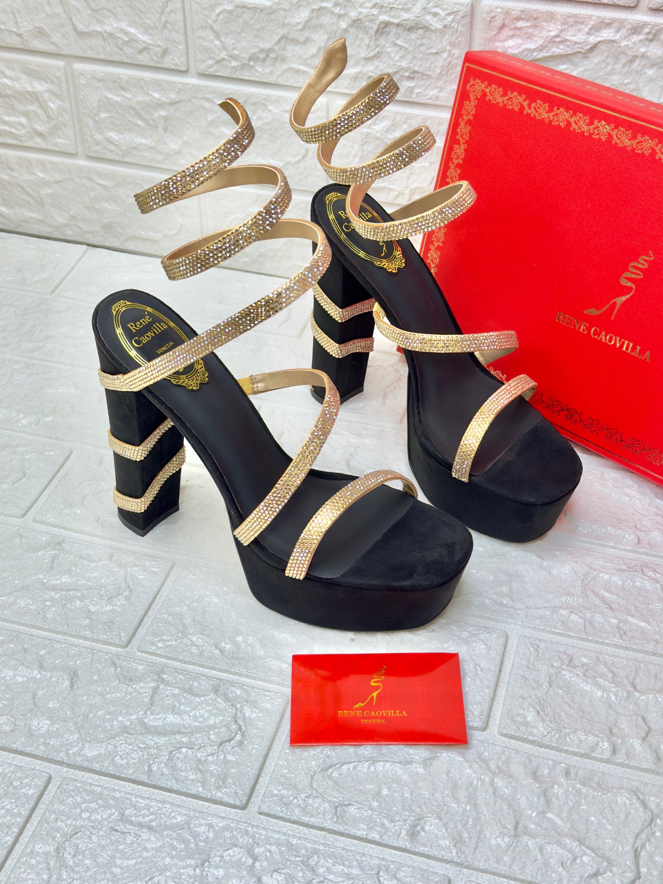 Ren? Caovilla Margot crystal-embellished platform sandals in black suede-effect fabric with a signature serpent-like ankle strap. image 1