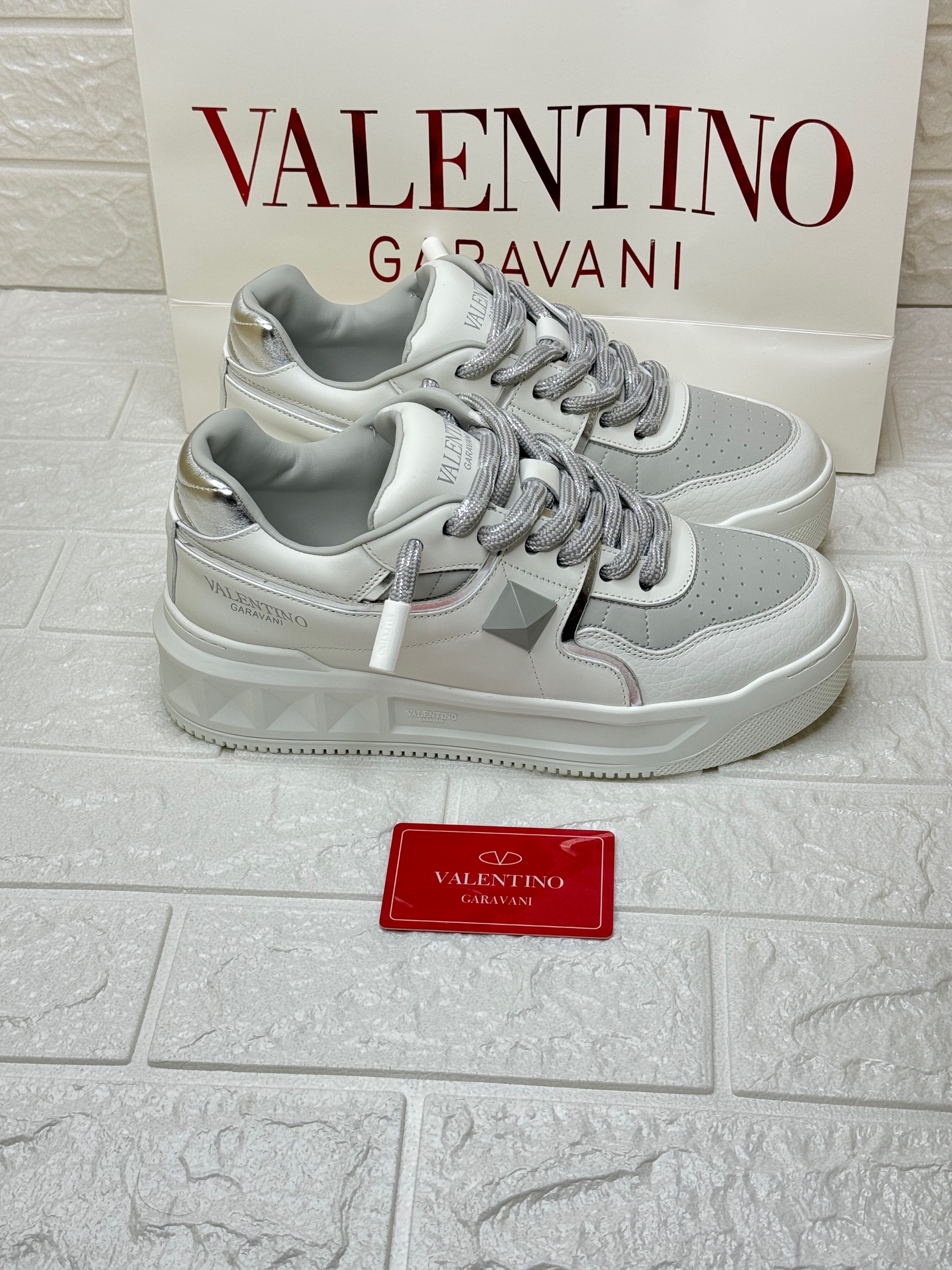 Valentino Garavani VL7N sneakers in a white or light grey colorway. image 1