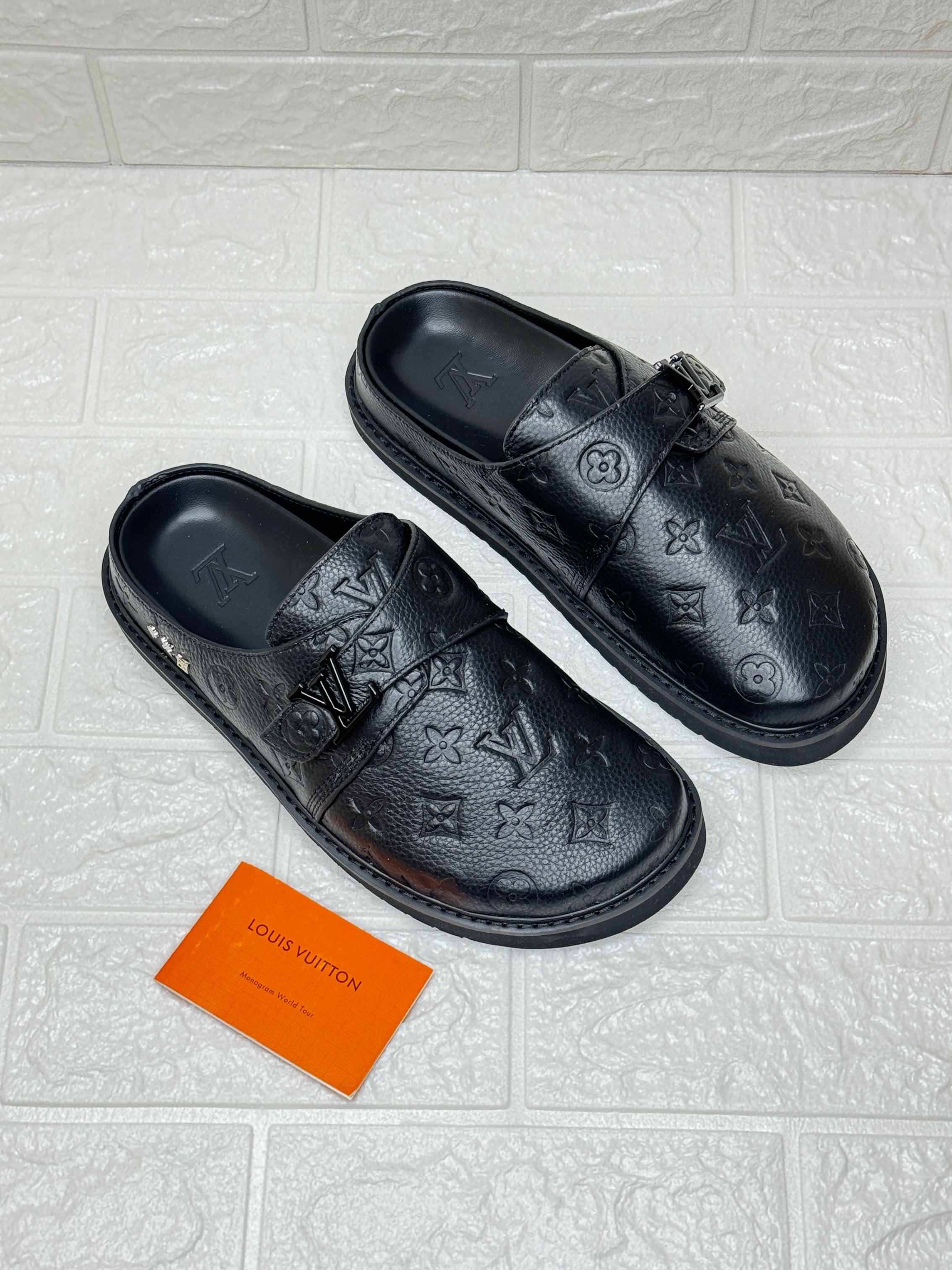 Louis Vuitton LV Easy mules in embossed black leather. image 1