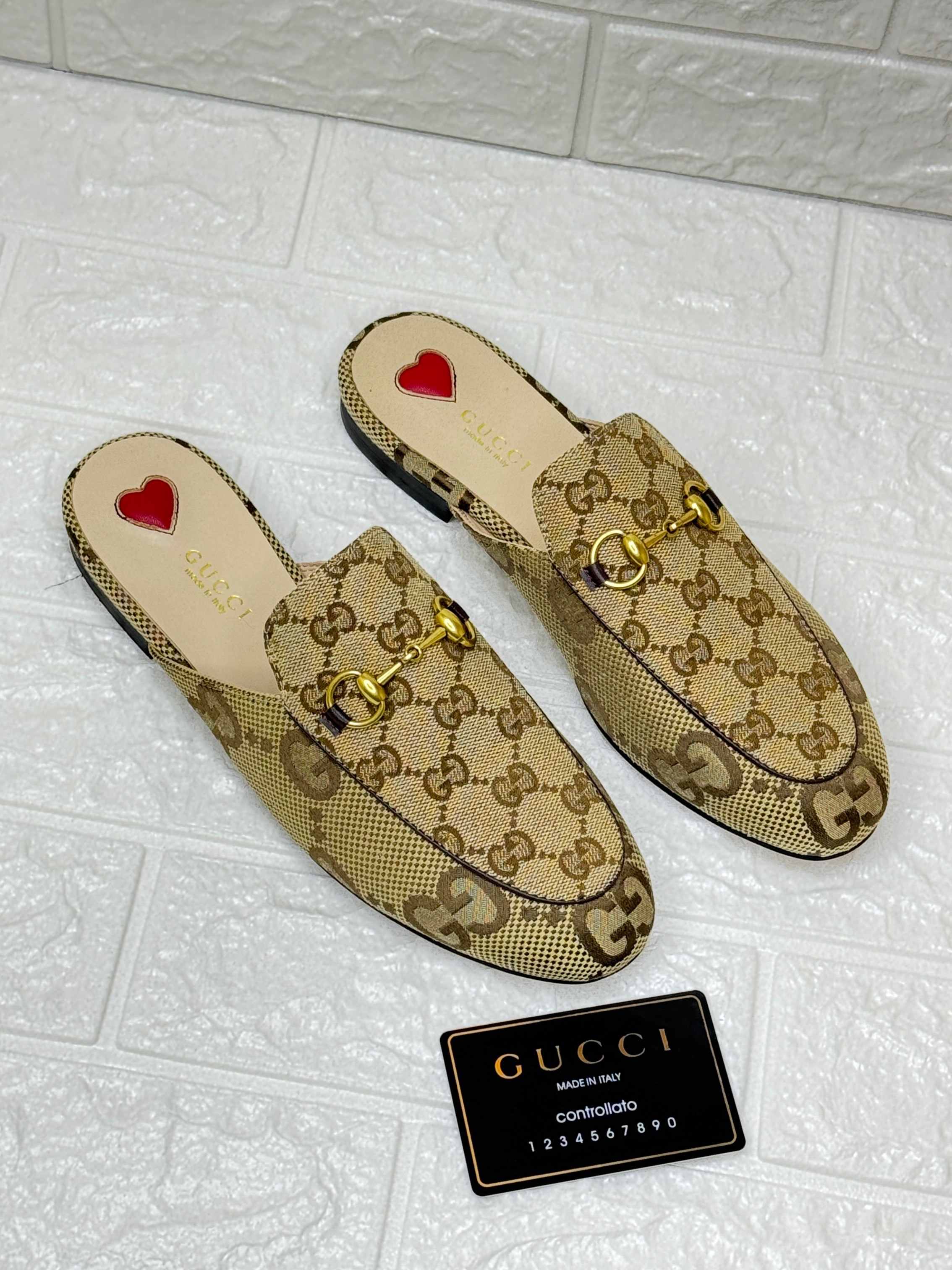 Gucci Princetown mules in monogram canvas with a gold-tone Horsebit detail. image 1