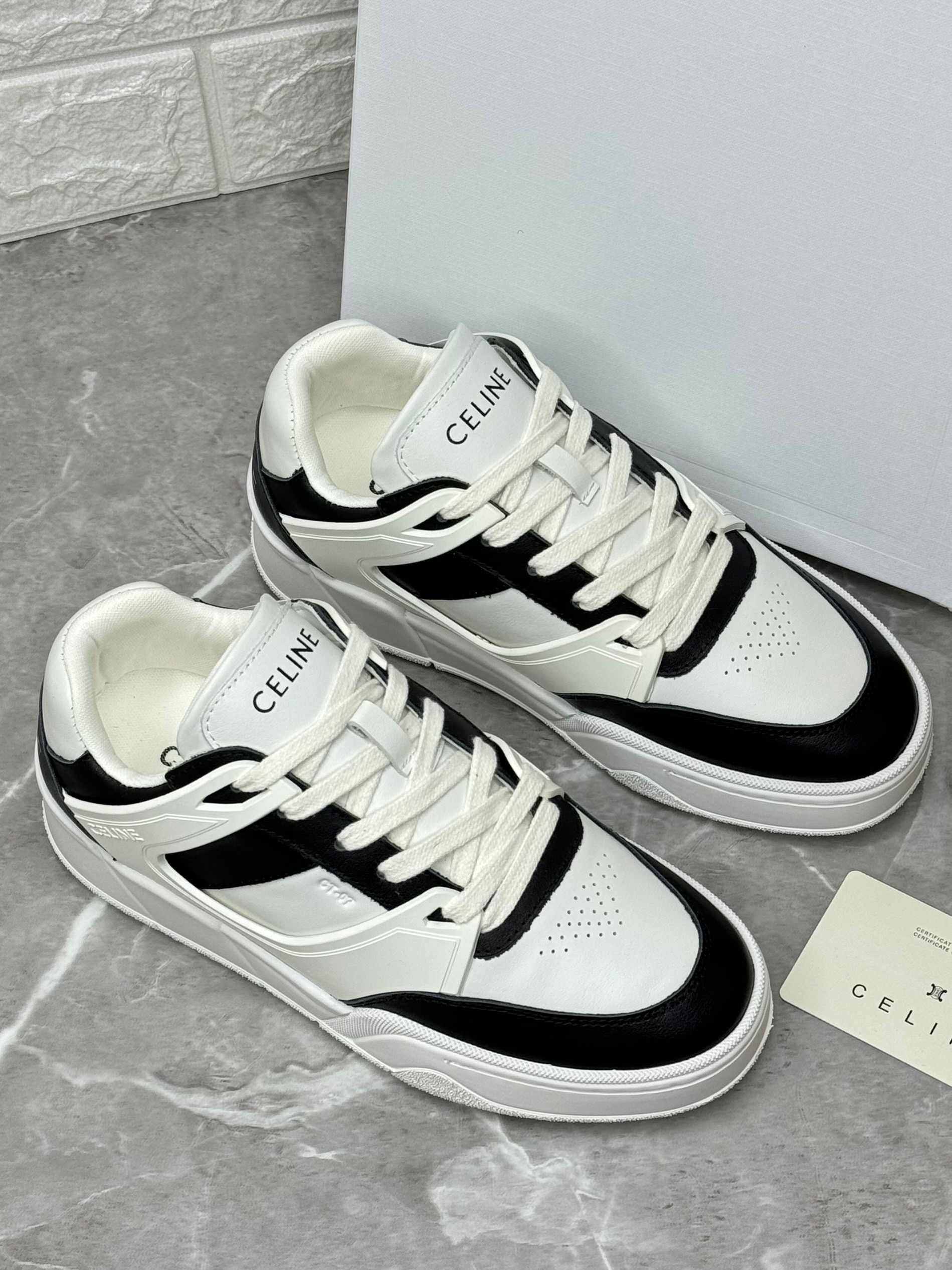 Celine Trainer CT-07 low-top sneaker in calfskin leather with white and black accents. image 1