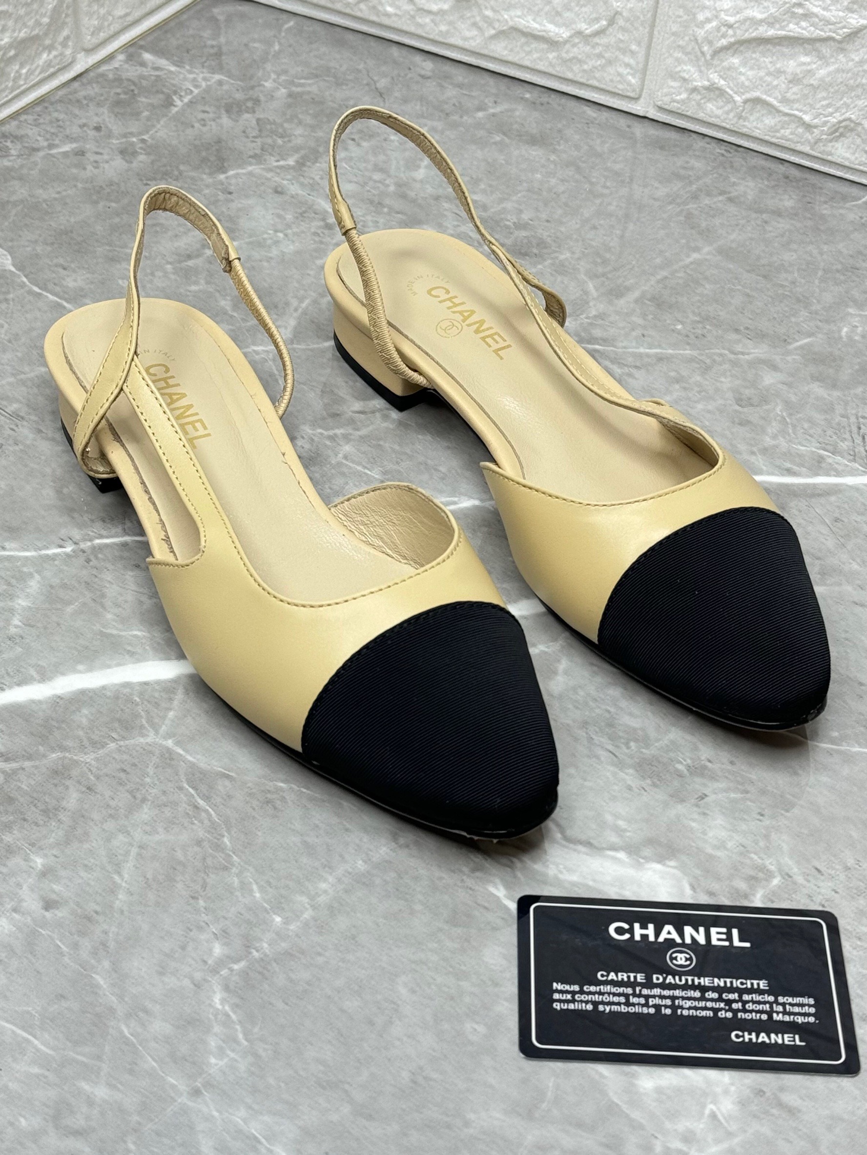 Chanel slingbacks in goatskin and grosgrain, beige and black. image 1