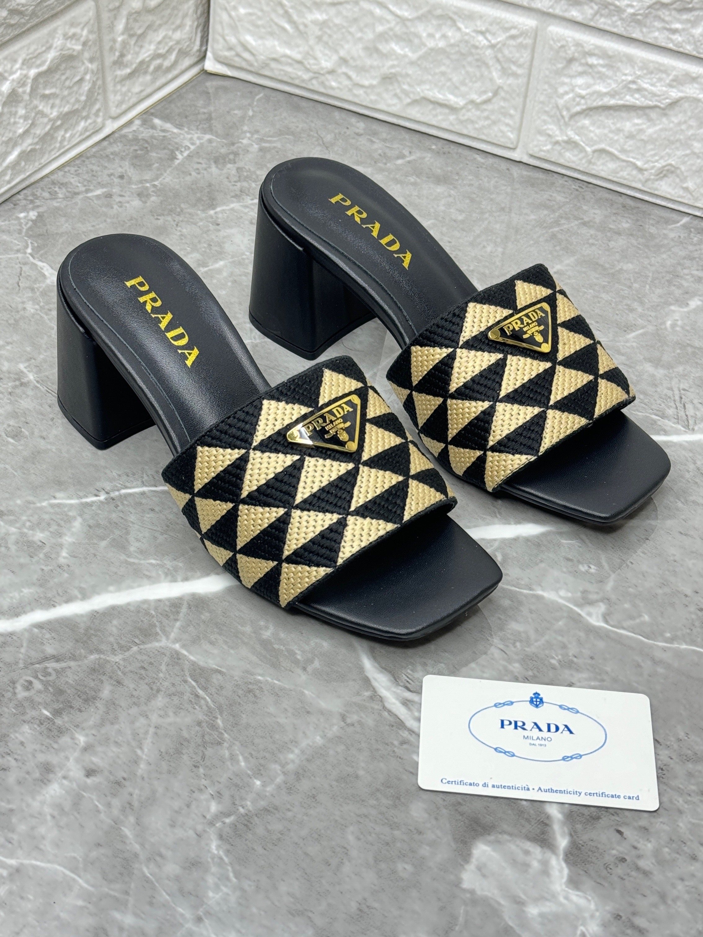 Prada Triangle Logo 65 mule sandals in black jacquard fabric with a 65mm block heel and square toe. image 1