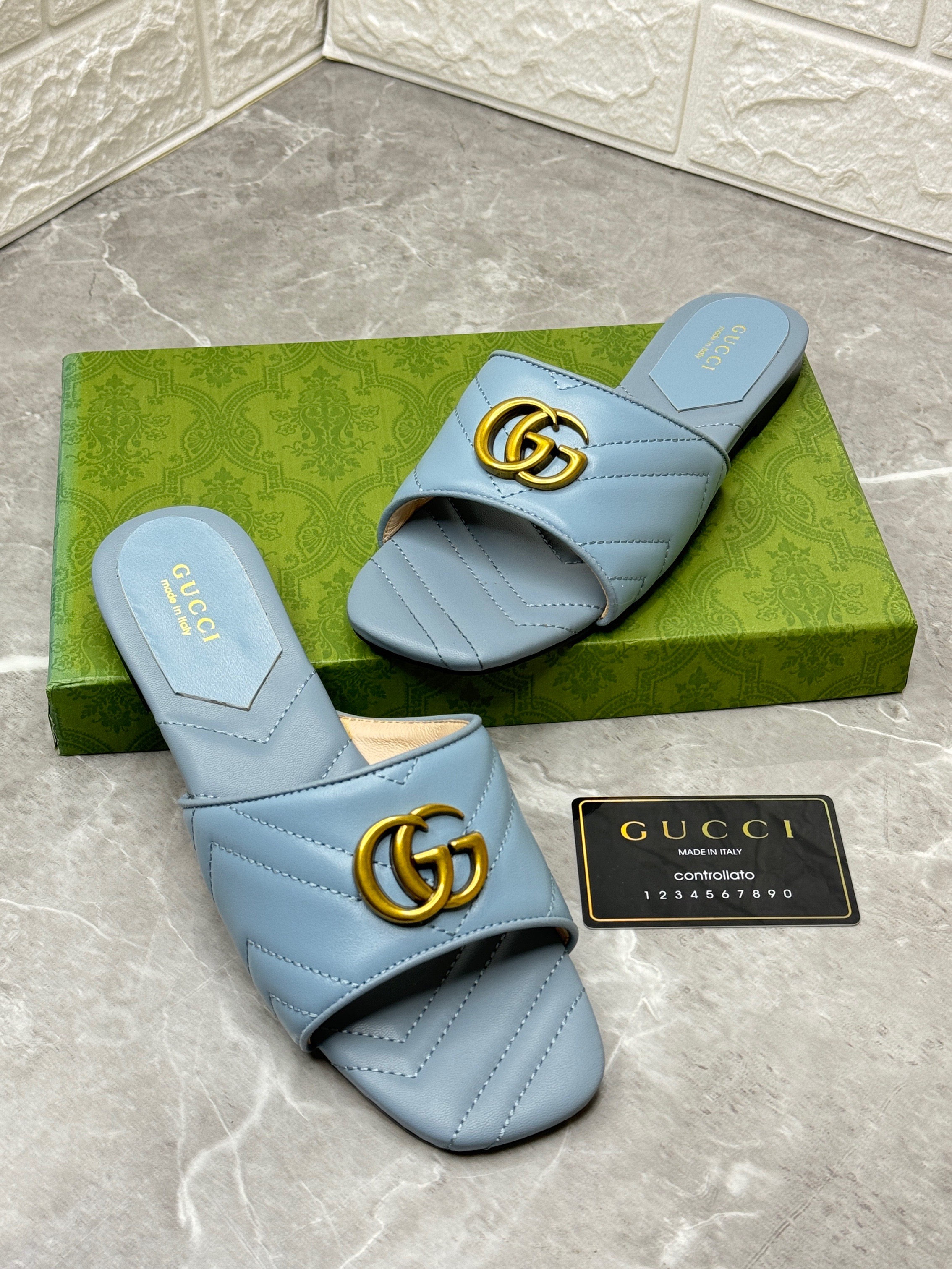 Gucci Double G slide sandals in quilted blue leather. image 1