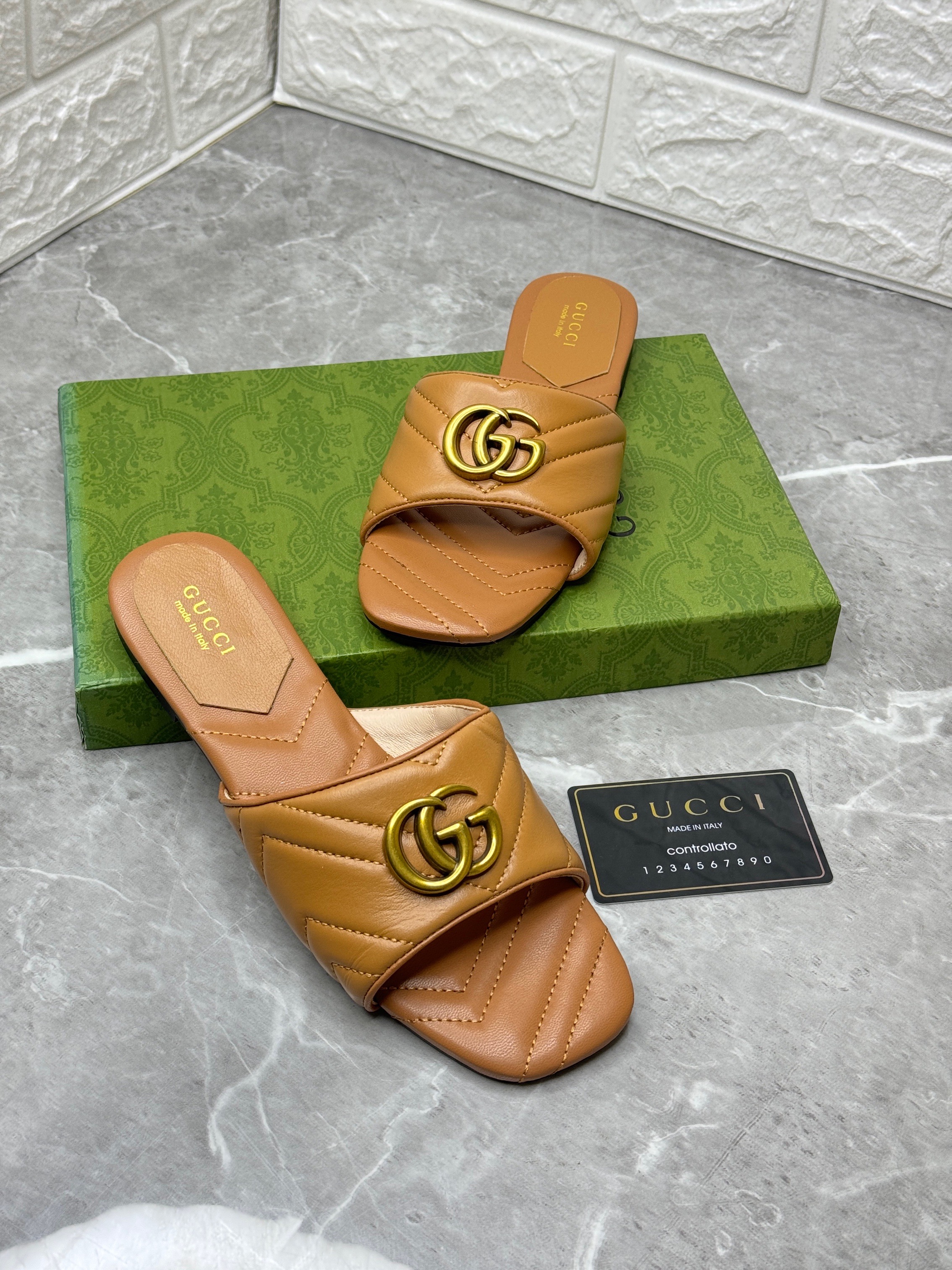 Gucci GG Marmont Matelasse leather mules sandals in a peachy pink color. image 1