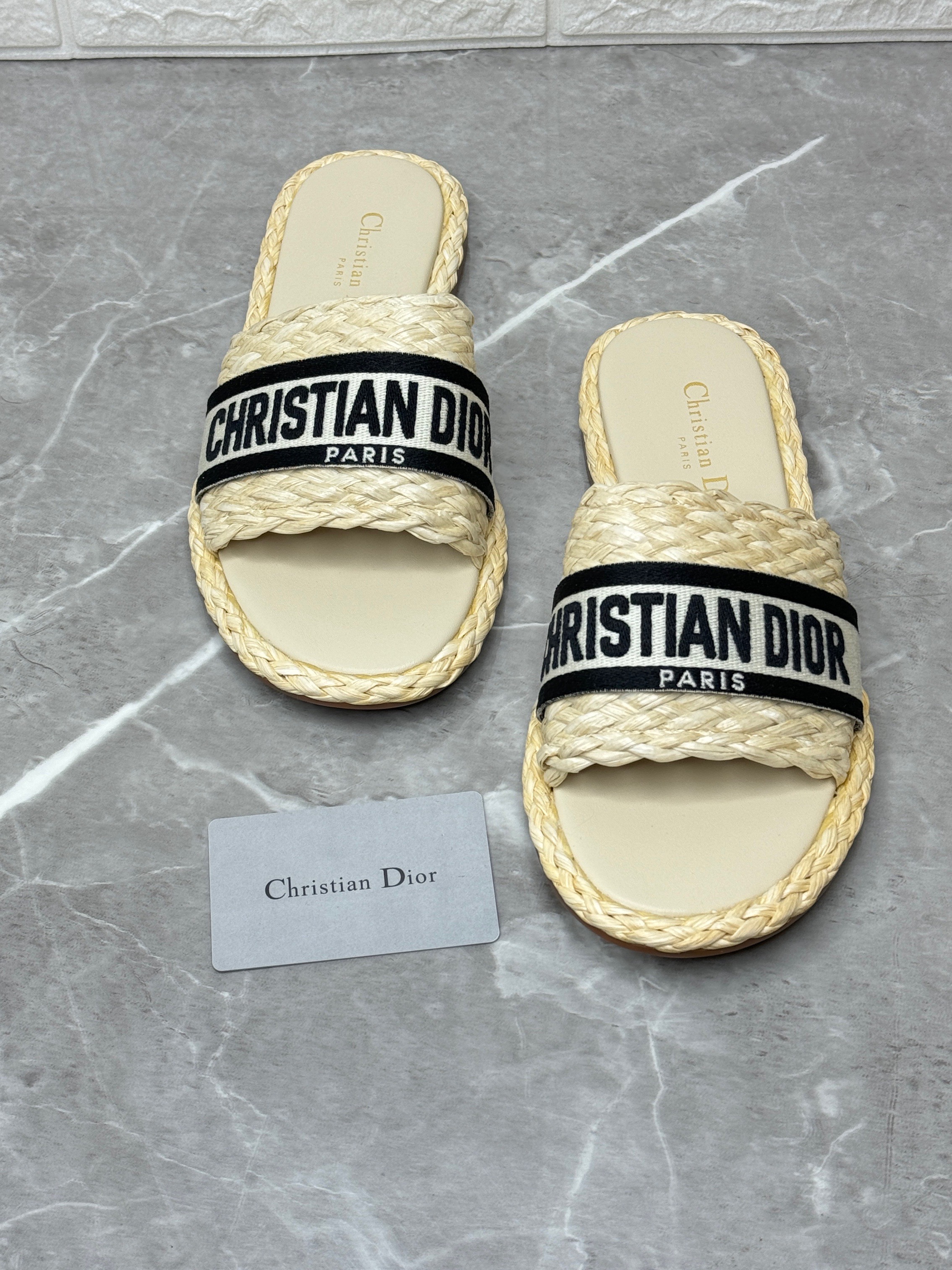Christian Dior Dway platform slides in a colorful, possibly raffia or straw, material with an embroidered "Christian Dior Paris" signature on the strap. image 1