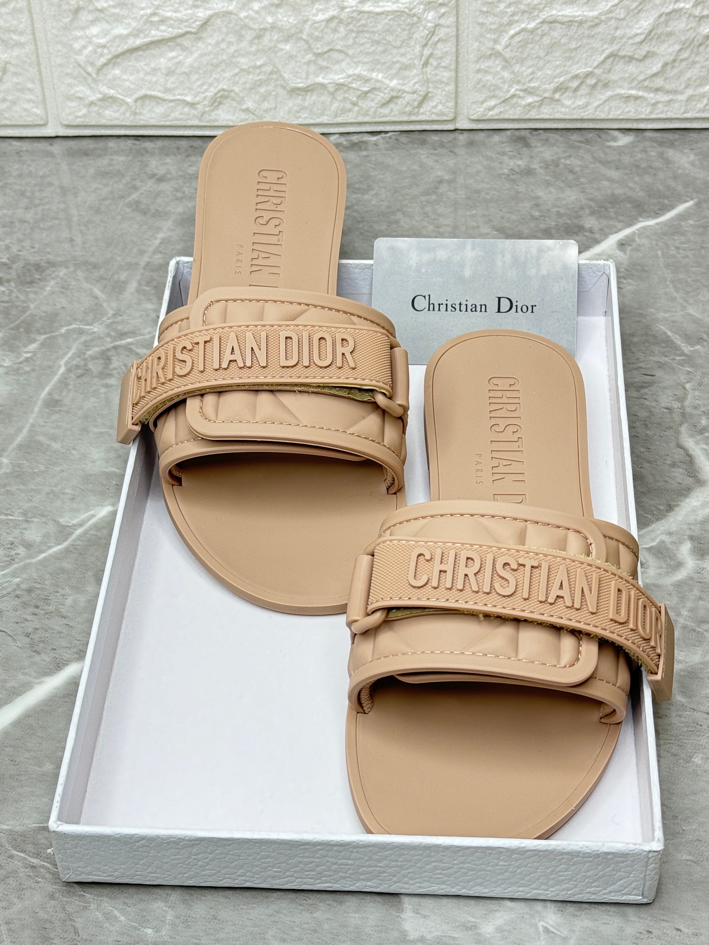 Dior Dior revolution mule sandals in a light brown rubber material. image 1