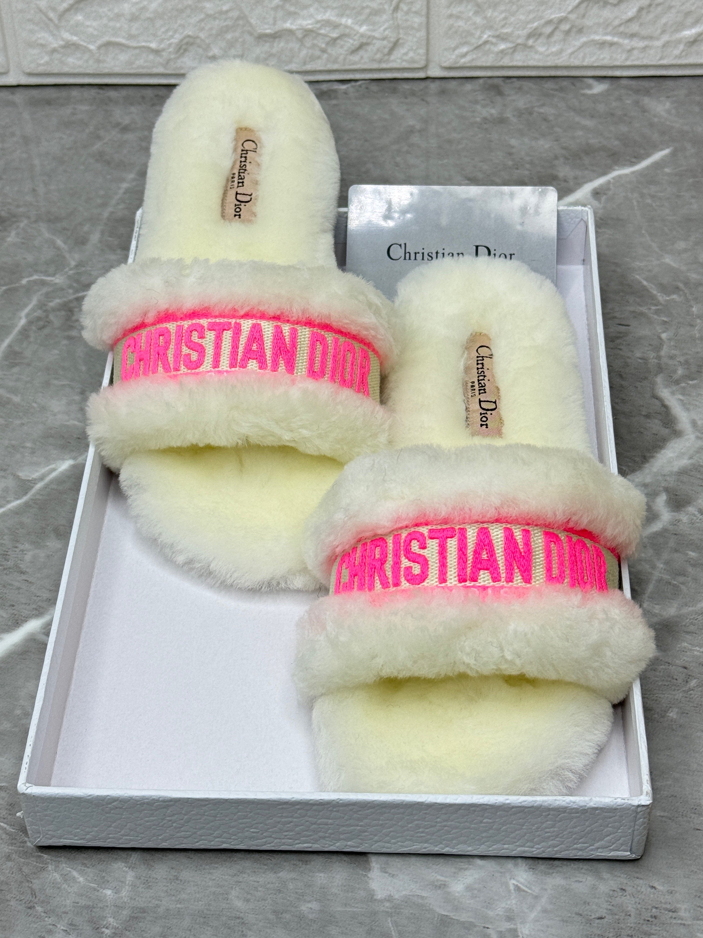 Dior Chez Moi flat slide sandals in white shearling with a pink "Christian Dior" embroidered signature. image 1